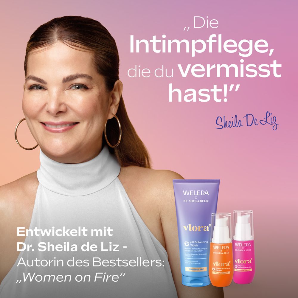 Frau mit Ohrringen lächelt. Neben ihr: Weleda Vlora+ Produkte. Text: Intimpflege, die du vermisst hast! Entwickelt mit Dr. Sheila de Liz.