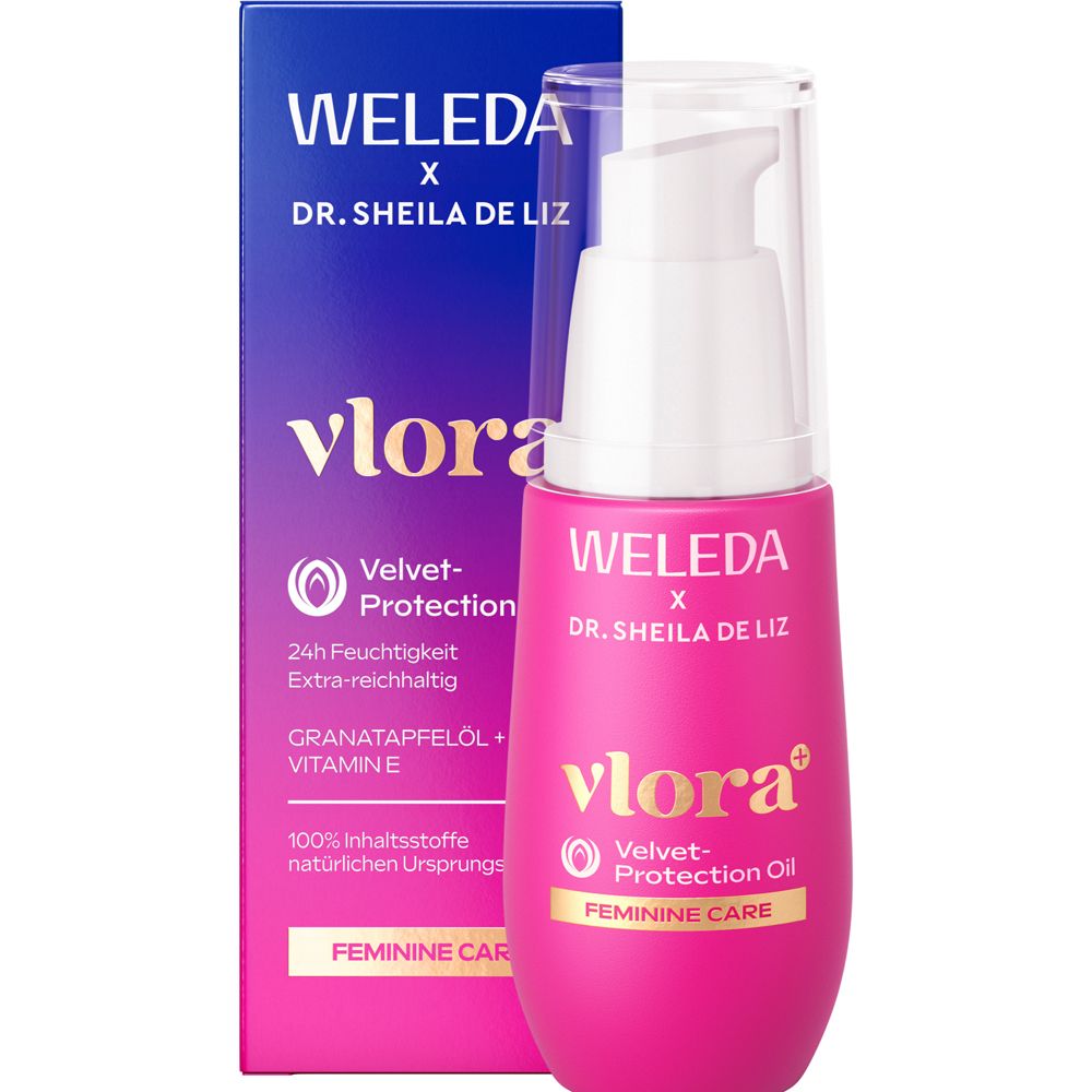Weleda Vlora+ Velvet Protection Oil. Pinke Flasche mit Pumpe und blauer Verpackung. Text: Weleda, Dr. Sheila De Liz.