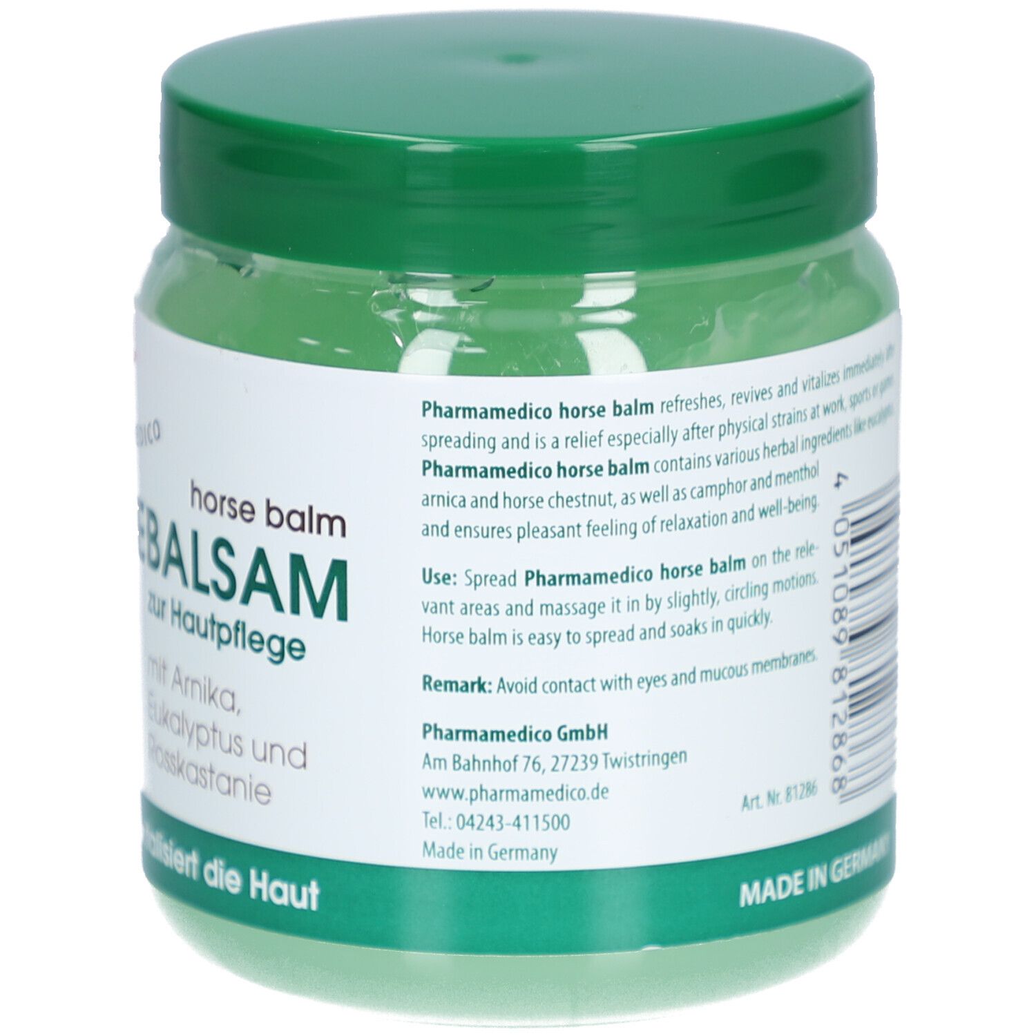 Grünes Glas mit grünem Deckel. Etikett mit Produktinformationen und Herstelleradresse. Barcode und Volumen: 500 ml.