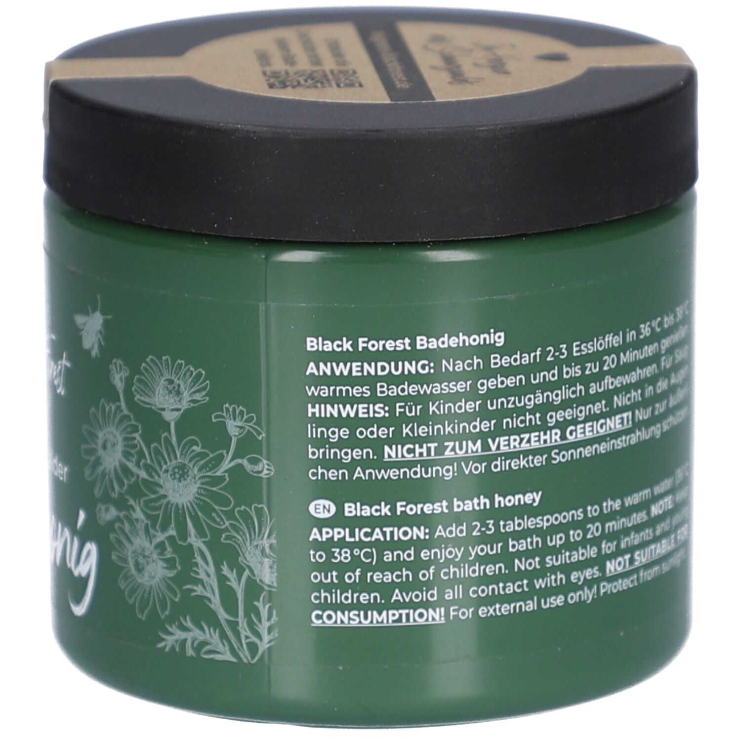 Grünes Glas mit schwarzem Deckel. Text auf Deutsch und Englisch. Hinweise zur Anwendung. Nicht für Kinder.