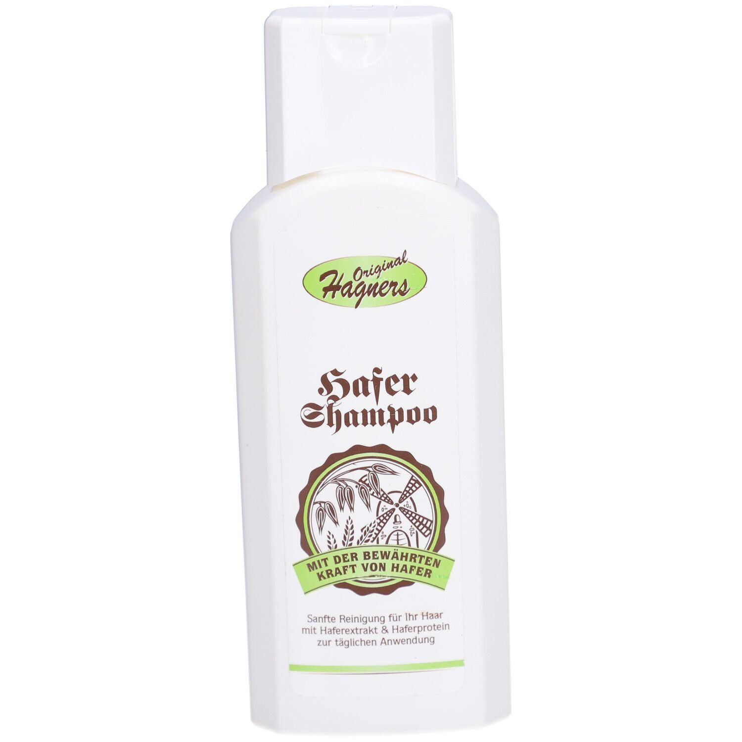 Weiße Flasche mit grünem Etikett. Aufschrift: Original Hägners Hafer Shampoo. Mit der gewählten Kraft von Hafer.