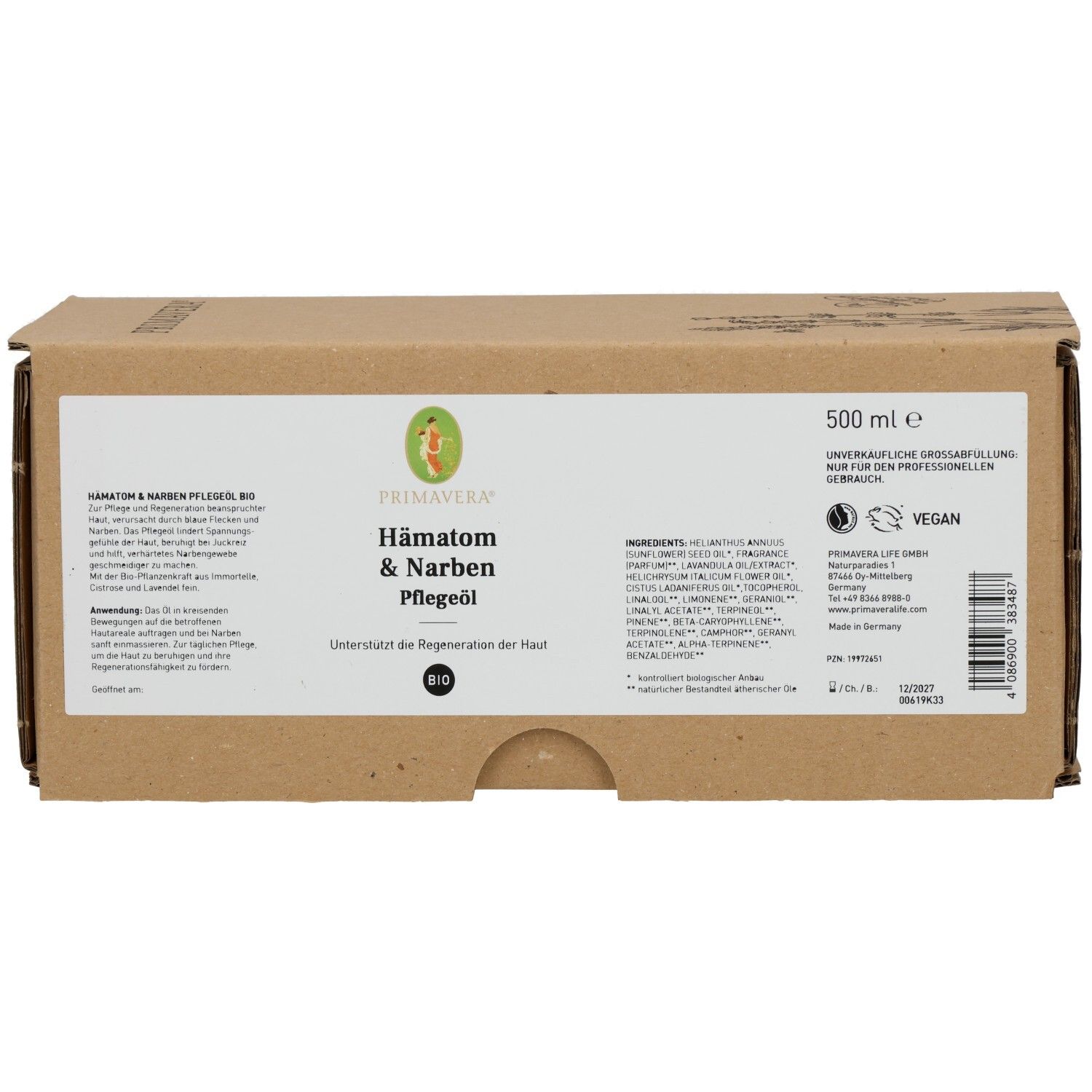 Braune Pappverpackung mit Produktinformationen. Aufschrift: HÄMATOM & Narben Pflegeöl Bio. Enthält 500 ml. Vegan-Siegel.