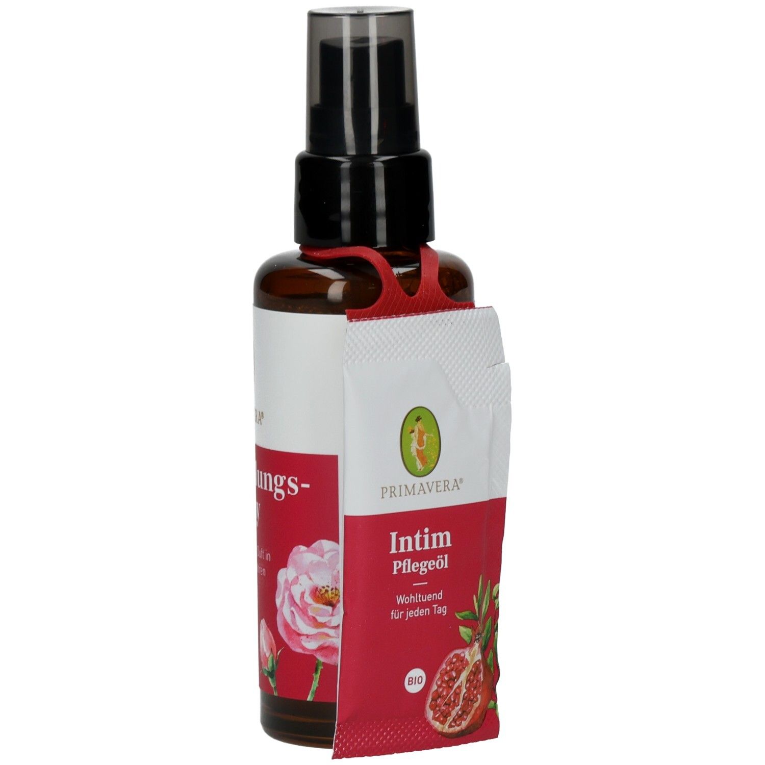 Braune Sprühflasche mit schwarzem Sprühkopf. Anhänger mit Text: Intim Pflegeöl. Aufschrift: Vegan, Bio.