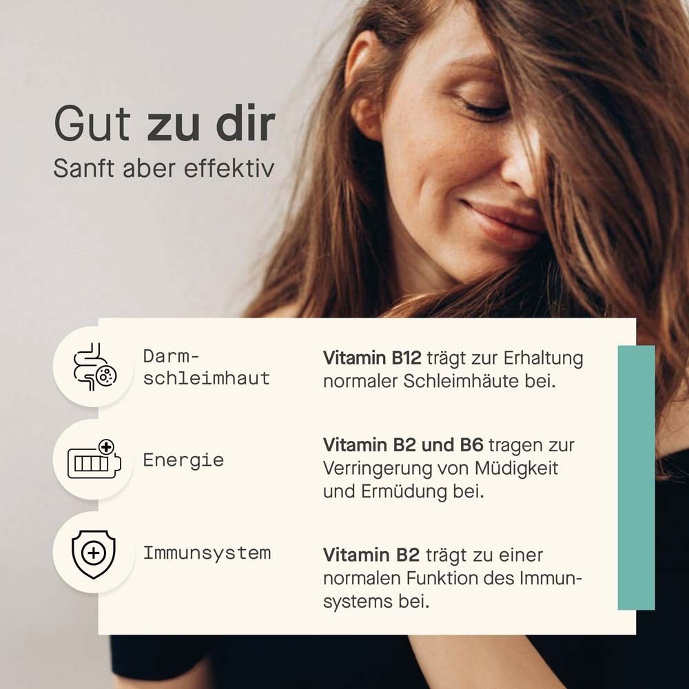 Frau lächelt. Text: Darm-schleimhaut, Energie, Immunsystem. Vitamin B12, B2 und B6. Für normale Funktionen.