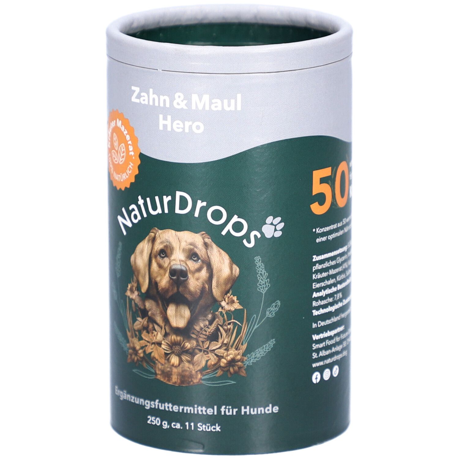 Zylindrische Dose mit Produktaufdruck. Aufschrift: Zahn & Maul Hero, NaturDrops. Bild eines Hundes. Ergänzungsfuttermittel für Hunde. 50 Stück.