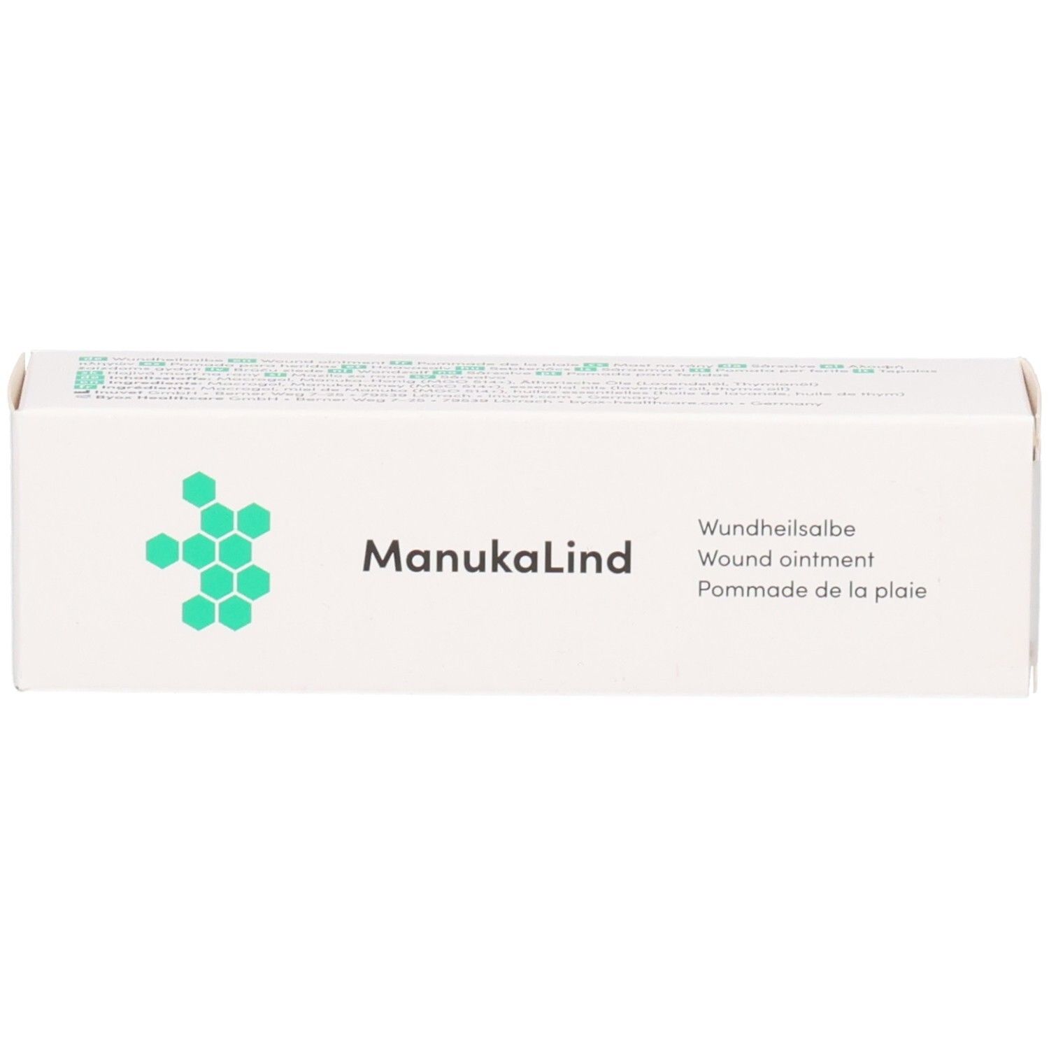 ManukaLind Wundheilsalbe Verpackung mit Bienenwaben-Logo und Produktbezeichnung.