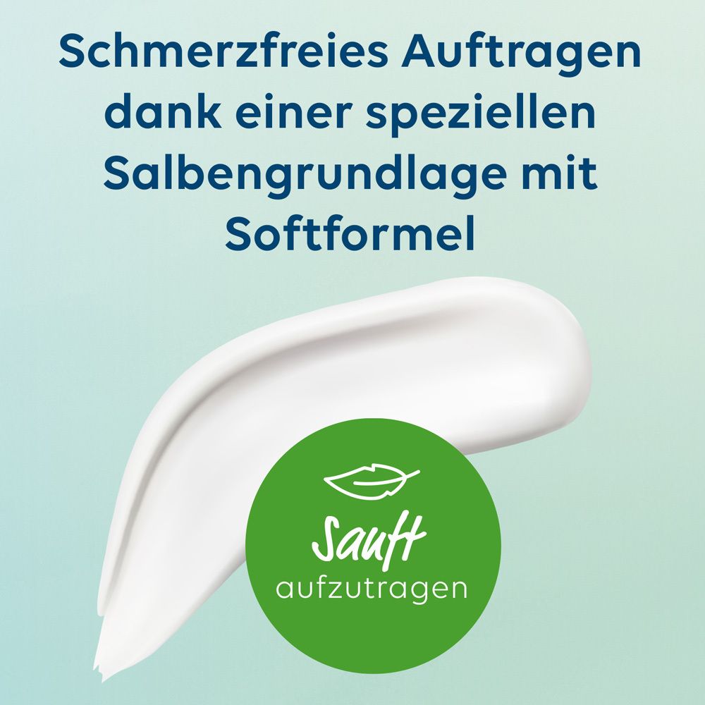 Weißer Salbenstrich. Text: Sanft aufzutragen. Grüner Kreis mit Blatt-Symbol.