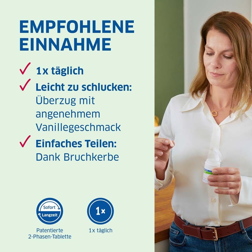 Frau hält Tablette. Text: 1x täglich. Leicht zu schlucken. Einfaches Teilen. 2-Phasen-Tabletten.