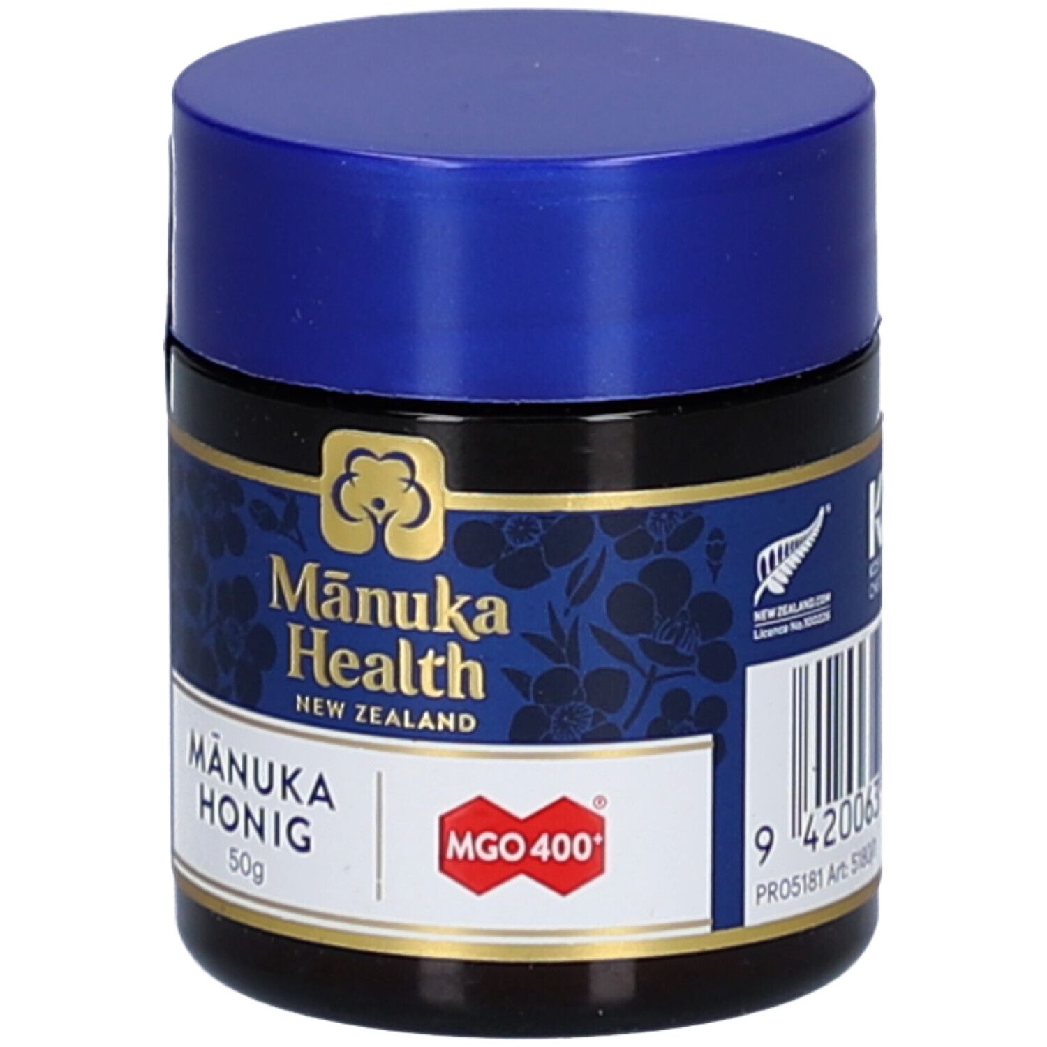 Braunes Glas mit blauem Deckel. Aufschrift: Mānuka Health, MGO 400+, Mānuka Honig, 50g. Logo: Blüte.