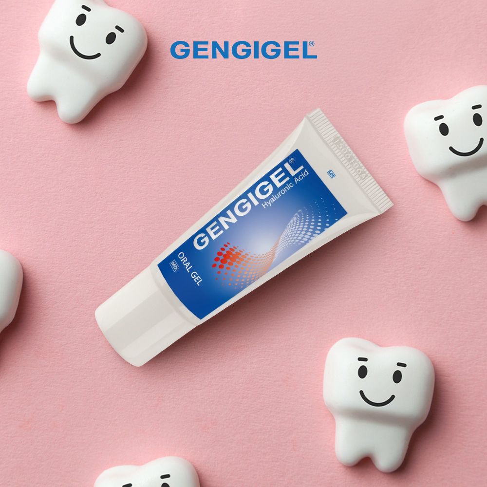 Gengigel Oral Gel Tube umgeben von lächelnden Zahnfiguren auf rosa Hintergrund.