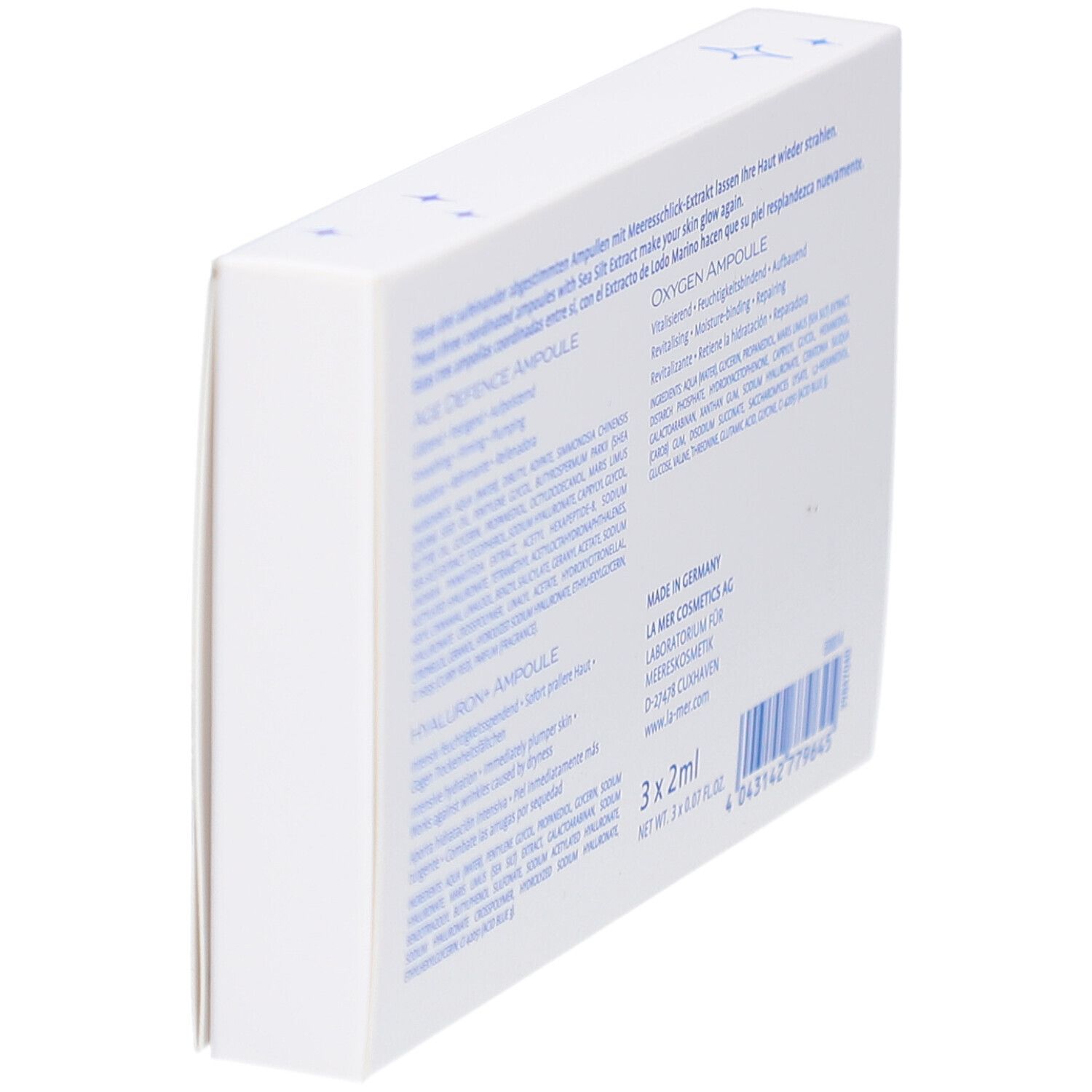 Rückseite der La mer Skin Glow Ampullen-Set Verpackung. Text: Inhaltsstoffe, 3x2ml, Made in Germany.