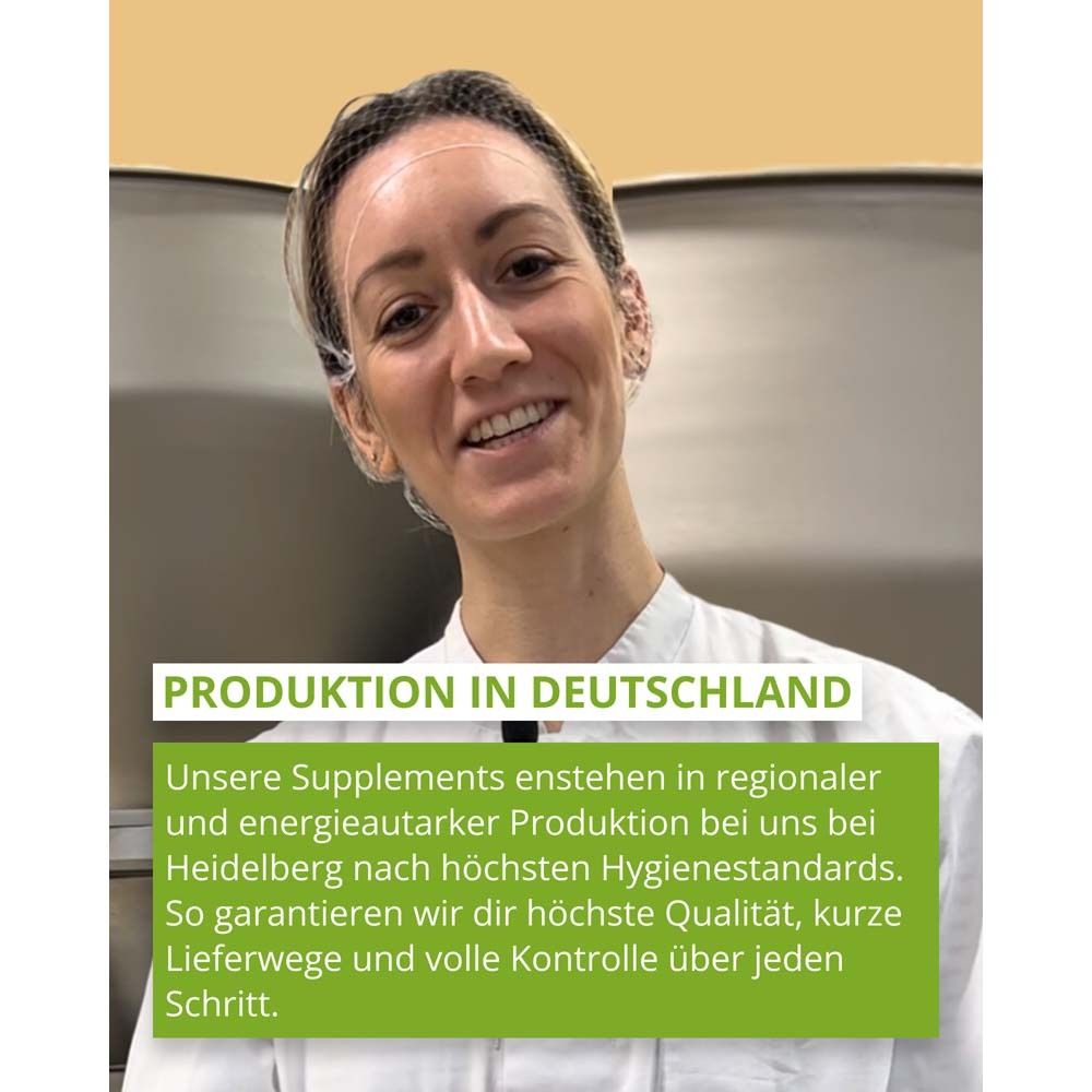 Frau in Produktionsstätte. Text: Produktion in Deutschland. Unsere Supplements entstehen in regionaler und energieautarker Produktion.