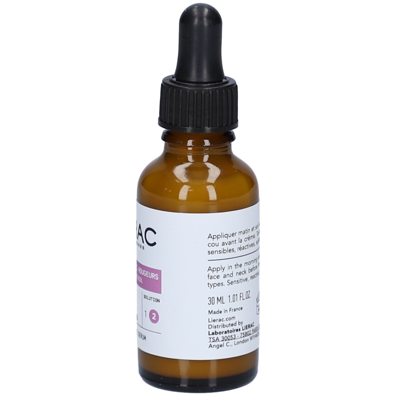 Braune Glasflasche mit schwarzem Tropfer. Etikett mit Text. Produktname nicht sichtbar.