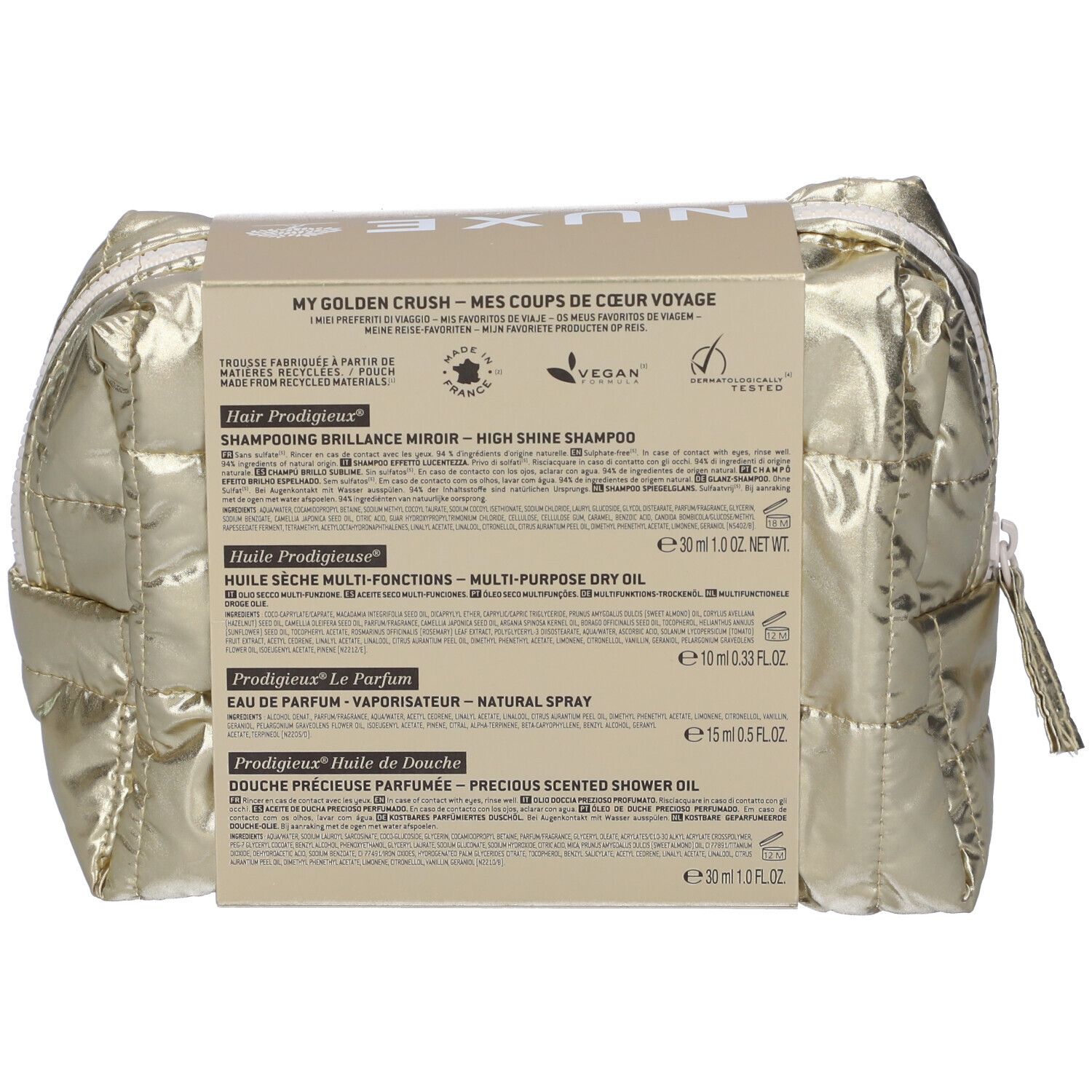 Rückseite der goldenen Kosmetiktasche mit Produktinformationen. Text: MY GOLDEN CRUSH, Hair Prodigieux, Huile Prodigieuse, Prodigieux le Parfum.