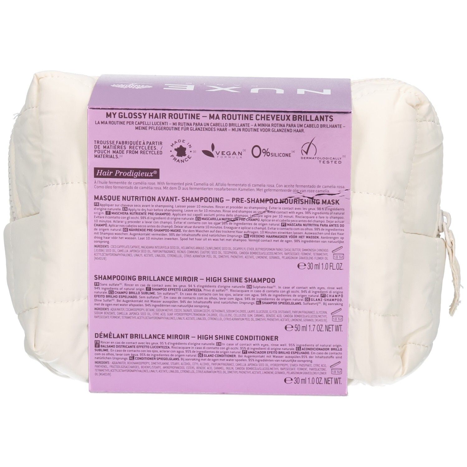Rückseite des NUXE Hair Prodigieux Kennenlern-Sets. Enthält Produktinformationen und Inhaltsstoffe. Cremefarbene Kosmetiktasche.