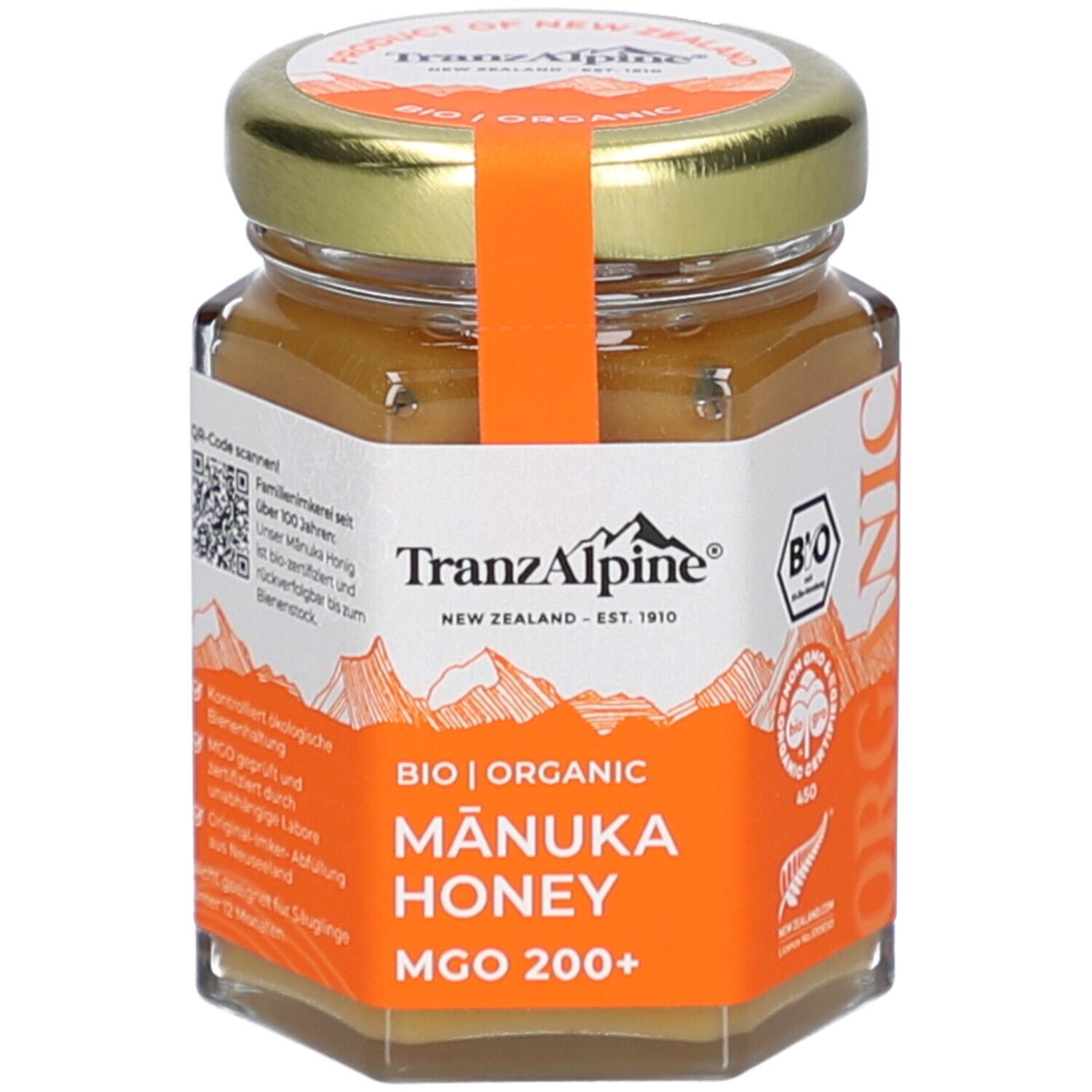 Glas mit BIO MANUKA Honig MGO 200+. Orangefarbenes Etikett mit Text und Logo. Deckel mit orangefarbenem Band.