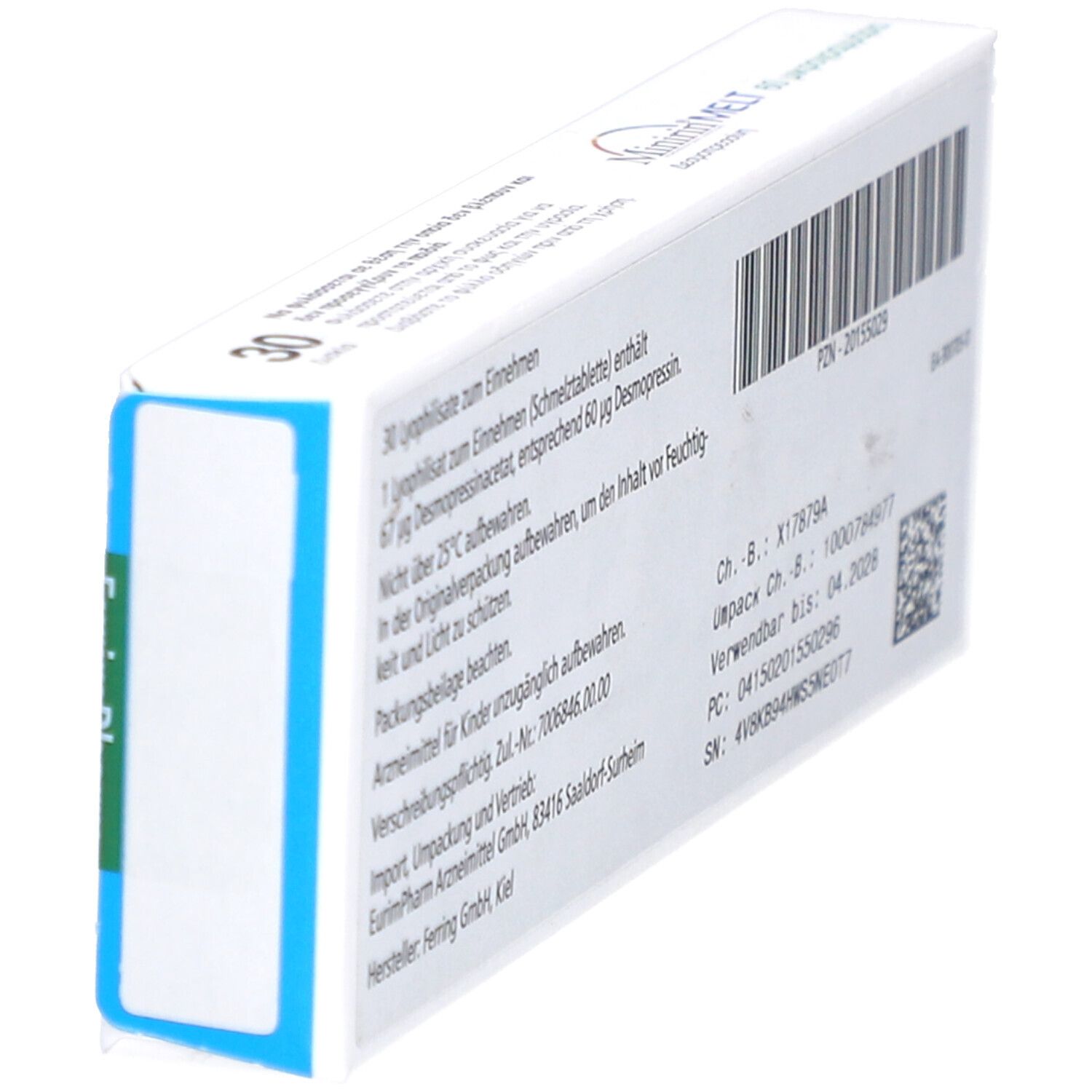 Rückseite der Minirin-Schachtel, schräg. Text mit Inhaltsangaben, Chargennummer, Verfallsdatum und Barcode.