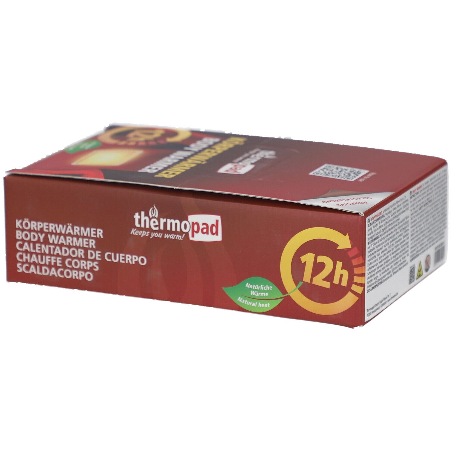 Braune Verpackung mit 'Körperwärmer Body Warmer'. Logo: thermopad. Grün: Natürliche Wärme. 12h. Text und QR-Code.