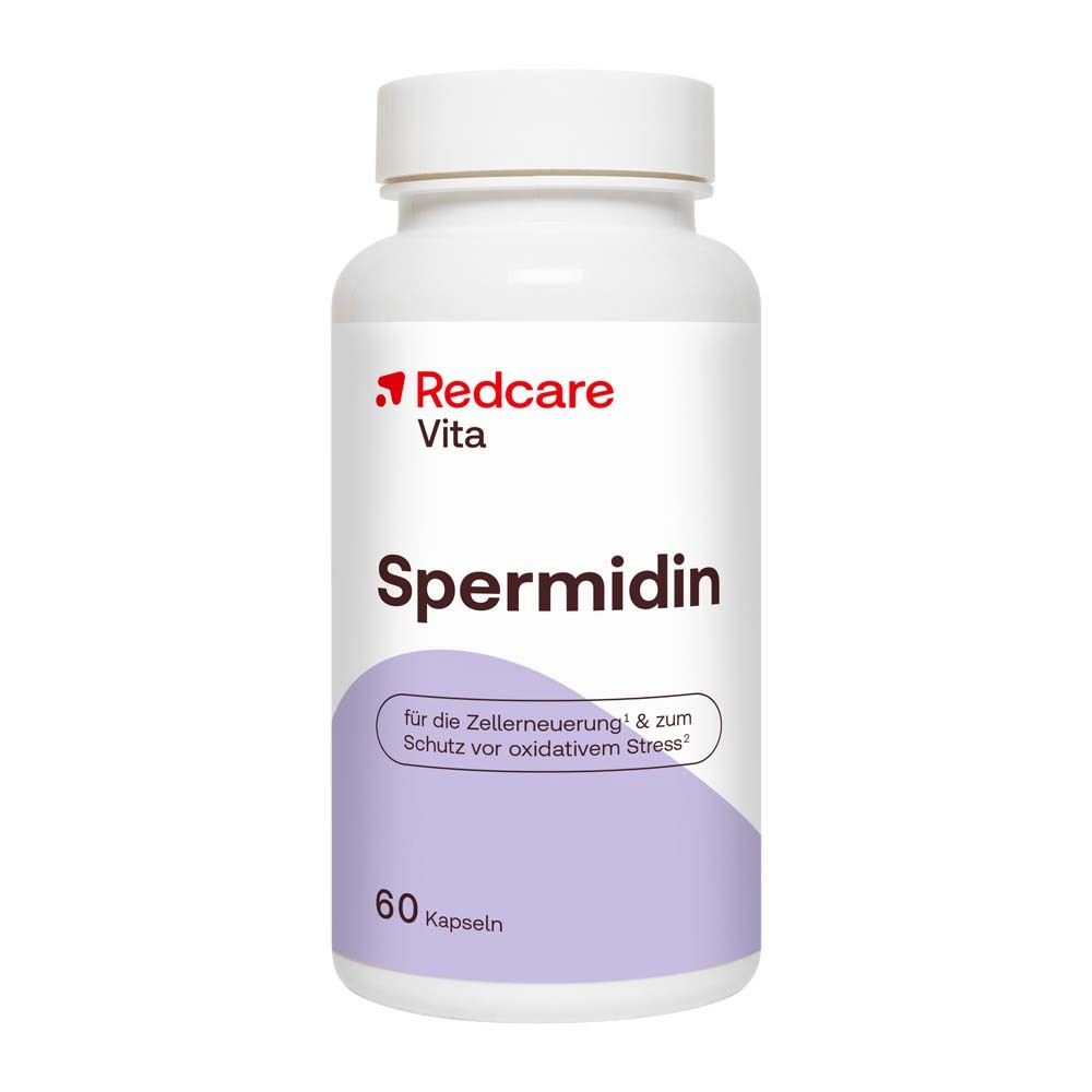 Weiße Flasche Redcare Vita Spermidin. Aufschrift: 60 Kapseln. Enthält Weizenkeimextrakt, Zink und Vitamin B1. Lila Hintergrund.