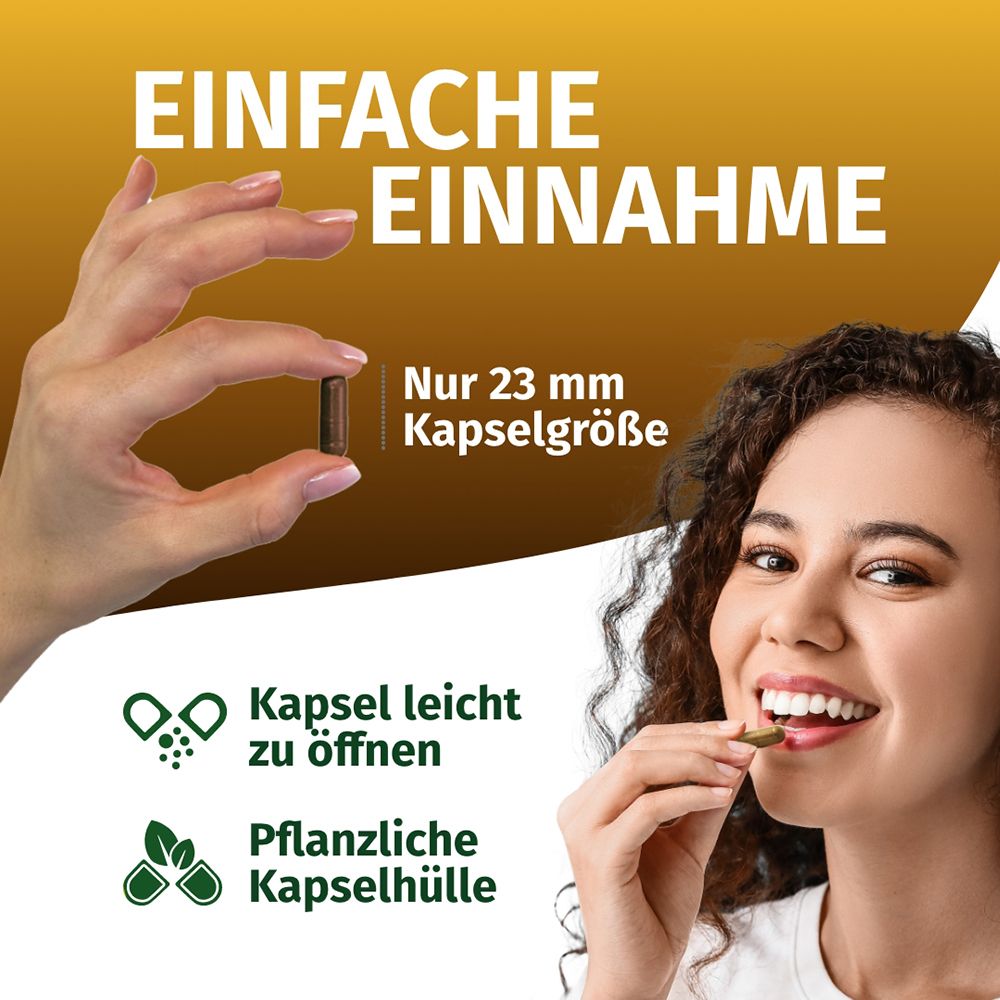 Frau hält 23 mm Kapsel. Leichte Einnahme, pflanzliche Kapselhülle.