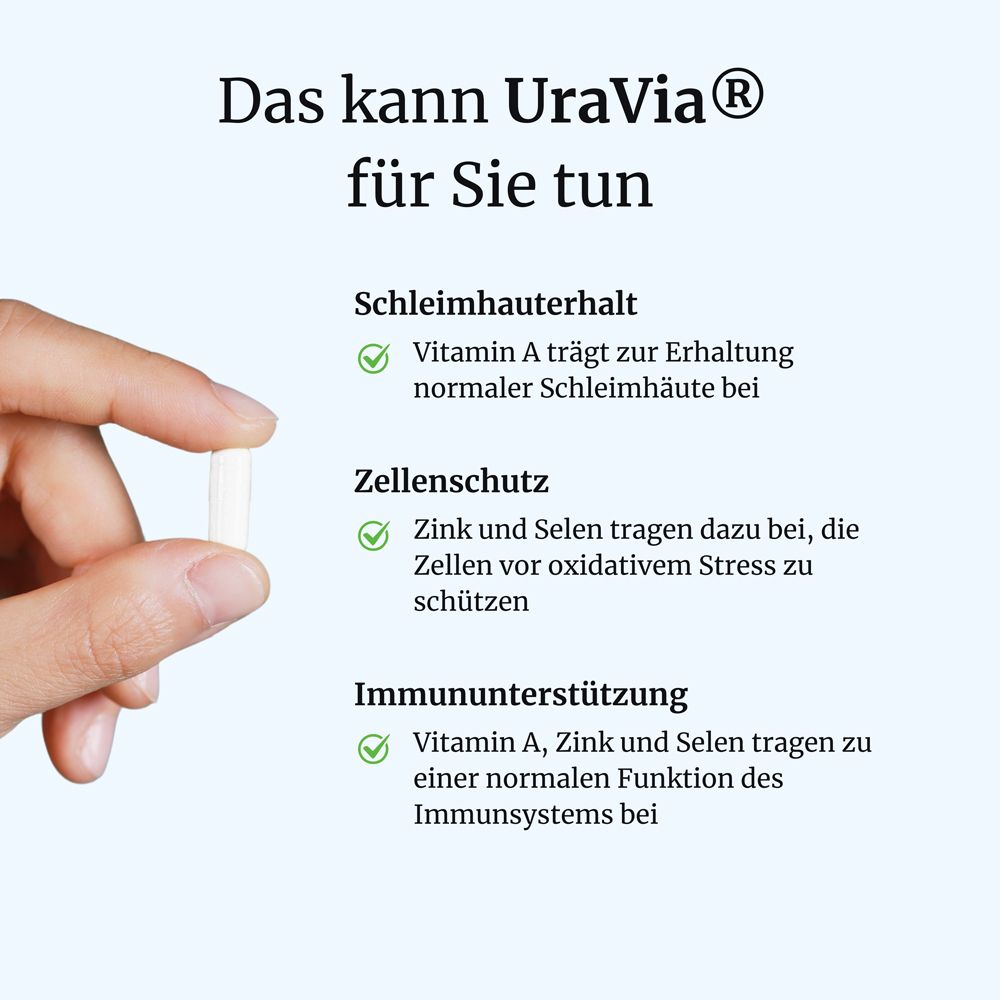 Hand hält eine weiße Kapsel von UraVia® intens. Text erklärt Vorteile für Schleimhaut, Zellschutz und Immunsystem.
