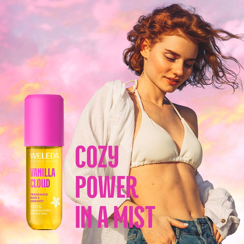 Weleda Vanilla Cloud Body & Hair Mist neben einer Frau. Hintergrund: Himmel mit Wolken. Text: Cozy Power in a Mist.