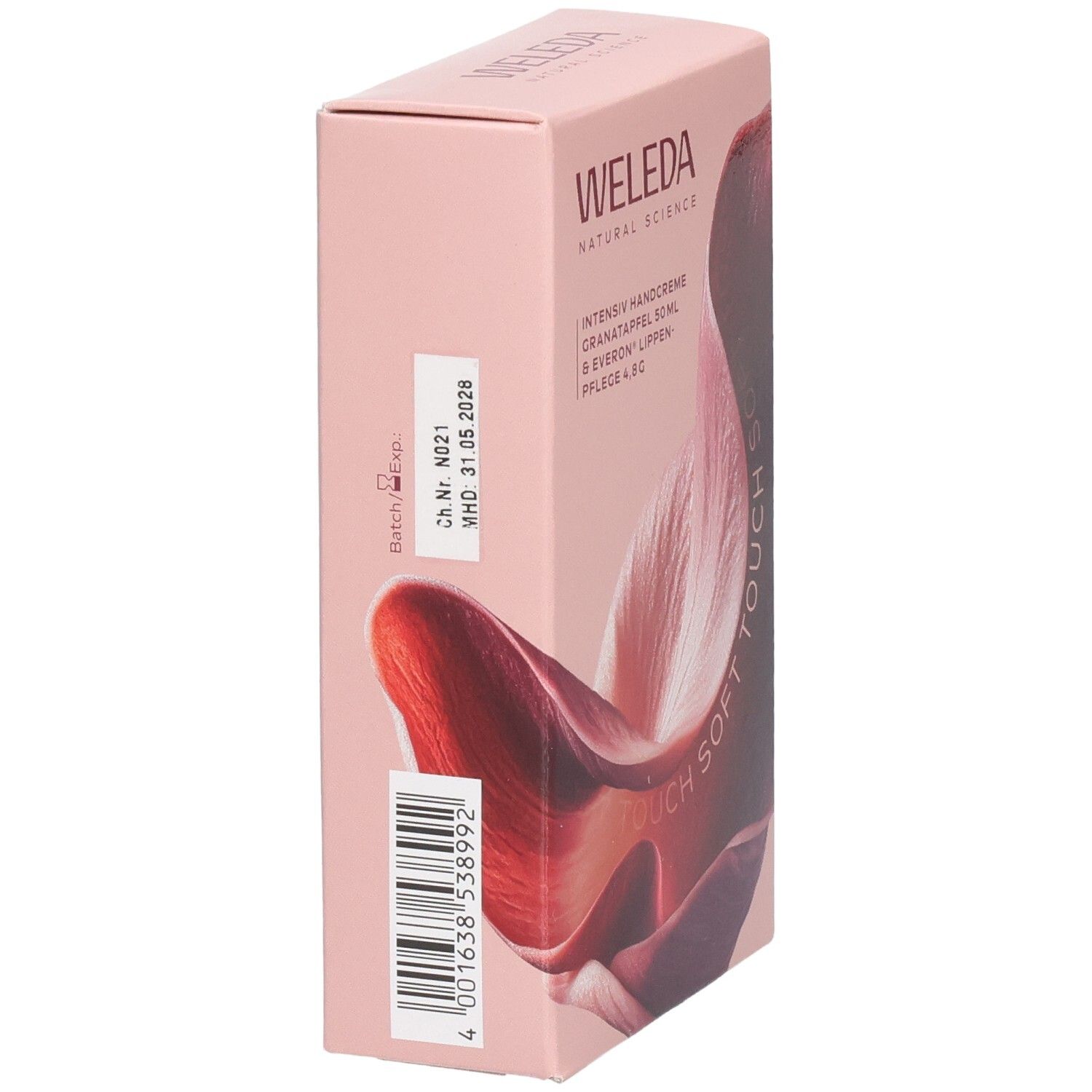 Rosa Geschenkbox mit WELEDA-Logo. Aufdruck: Chargennummer, Verfallsdatum, Barcode.