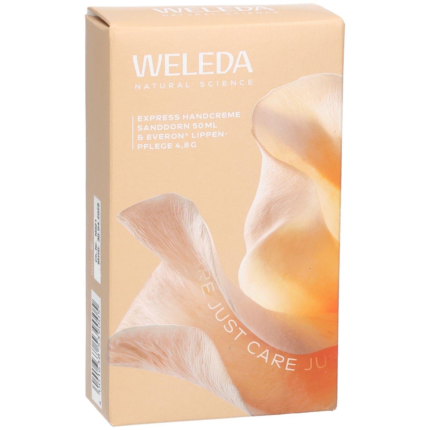 Geschenkbox, Frontansicht. WELEDA-Logo. Produktnamen: Express Handcreme, Sanddorn, Everon Lippenpflege. Abbildung einer Blüte.
