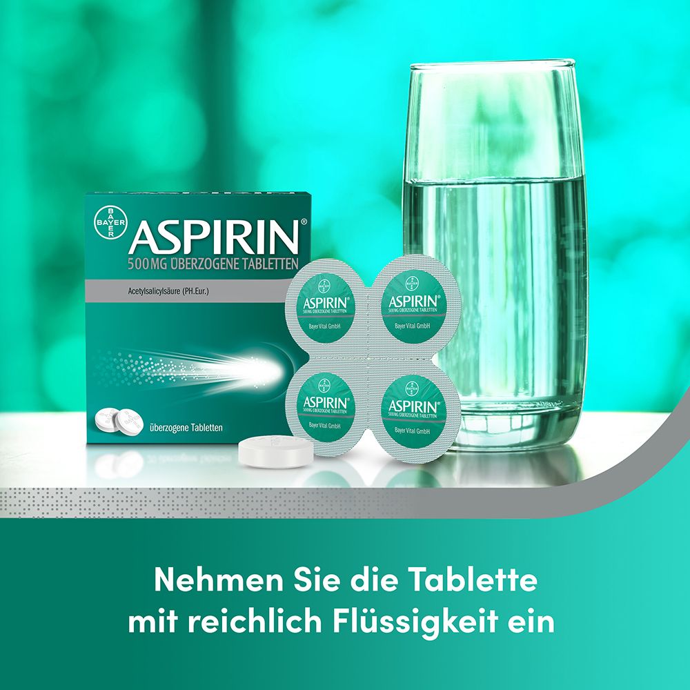 Aspirin 500 mg Tabletten mit Glas Wasser und Blisterpackung.
