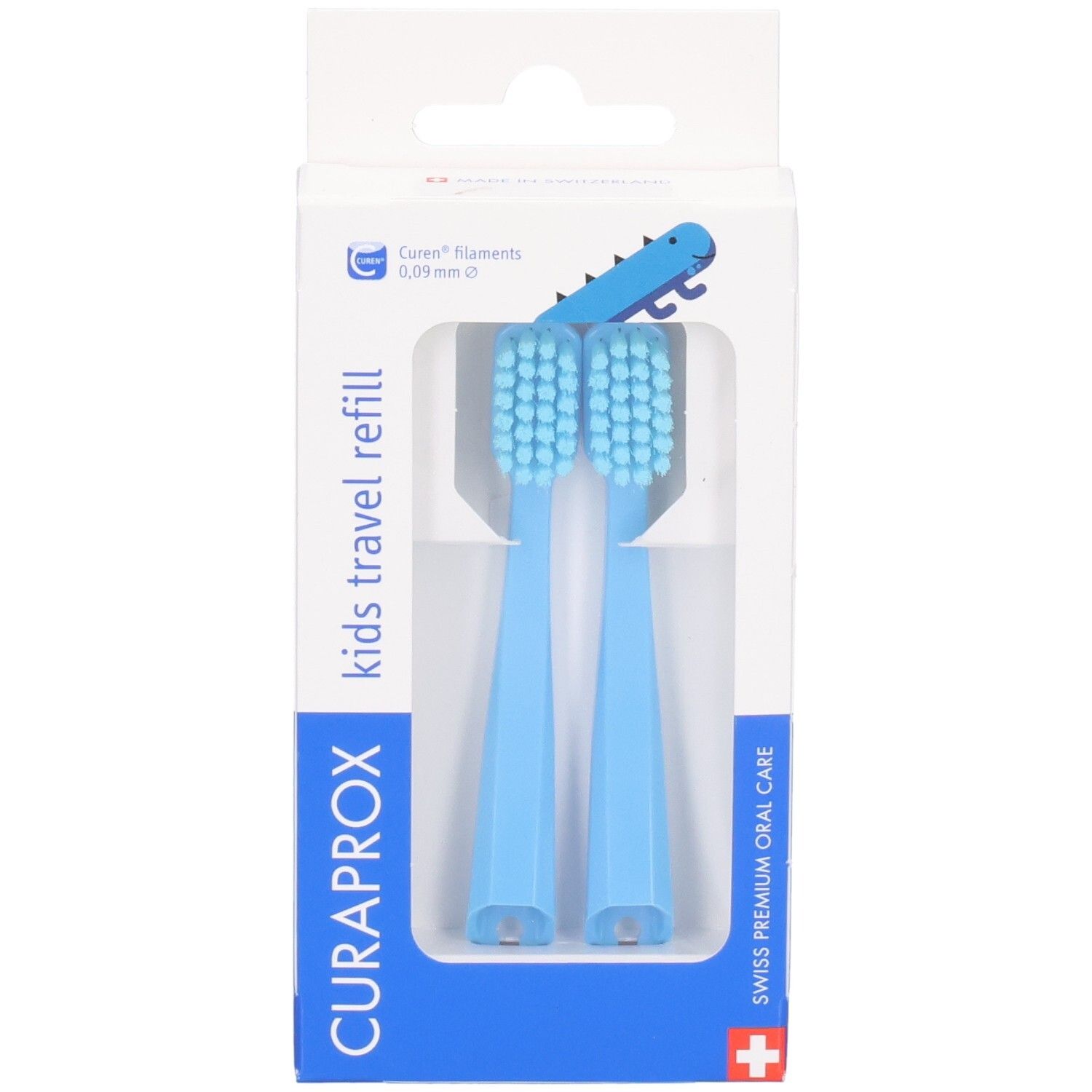 Zwei blaue Curaprox Kids Travel Refill Zahnbürstenköpfe in Verpackung mit Dino-Motiv.