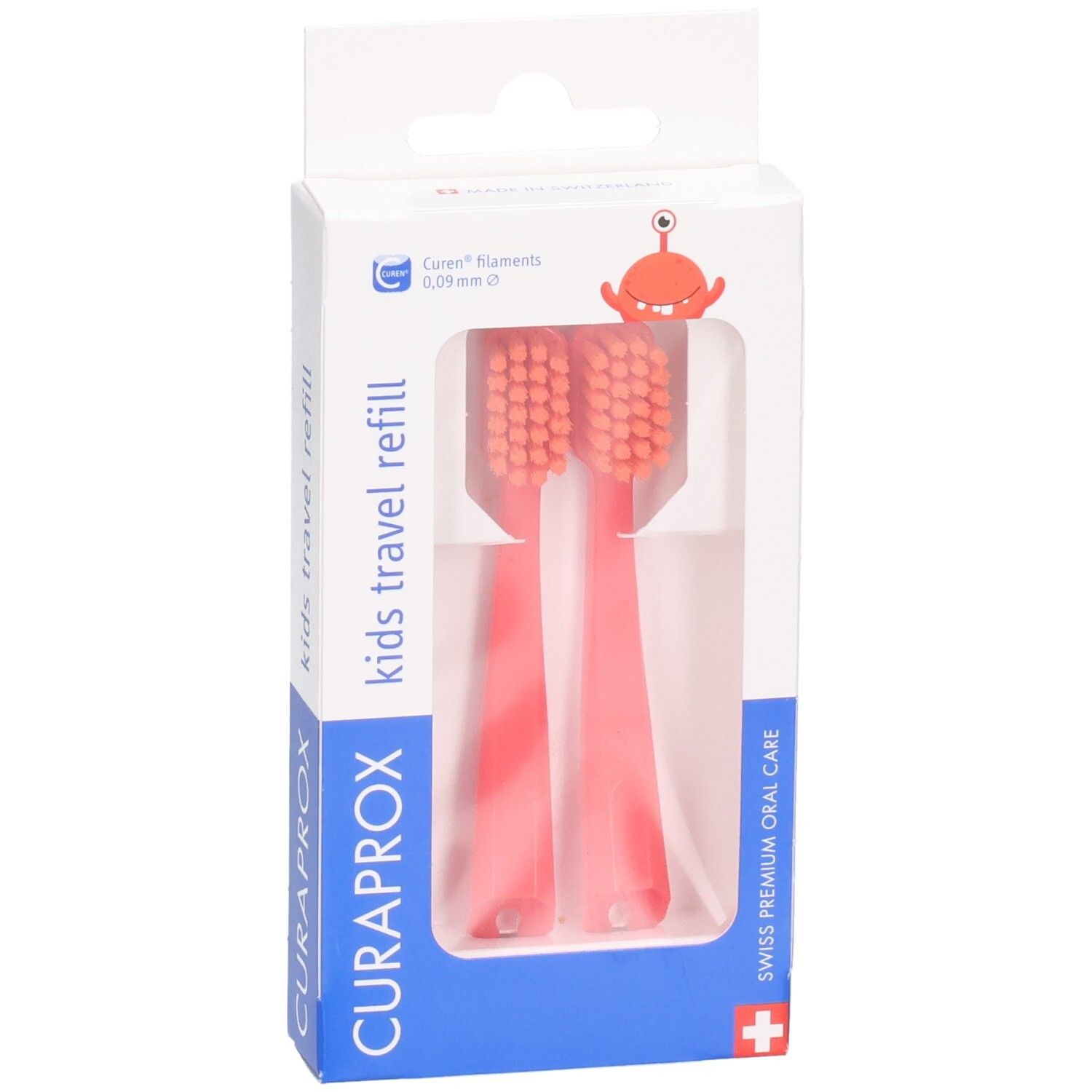 Verpackung mit zwei roten Curaprox Kids Travel Refill Zahnbürstenköpfen, leicht schräg.