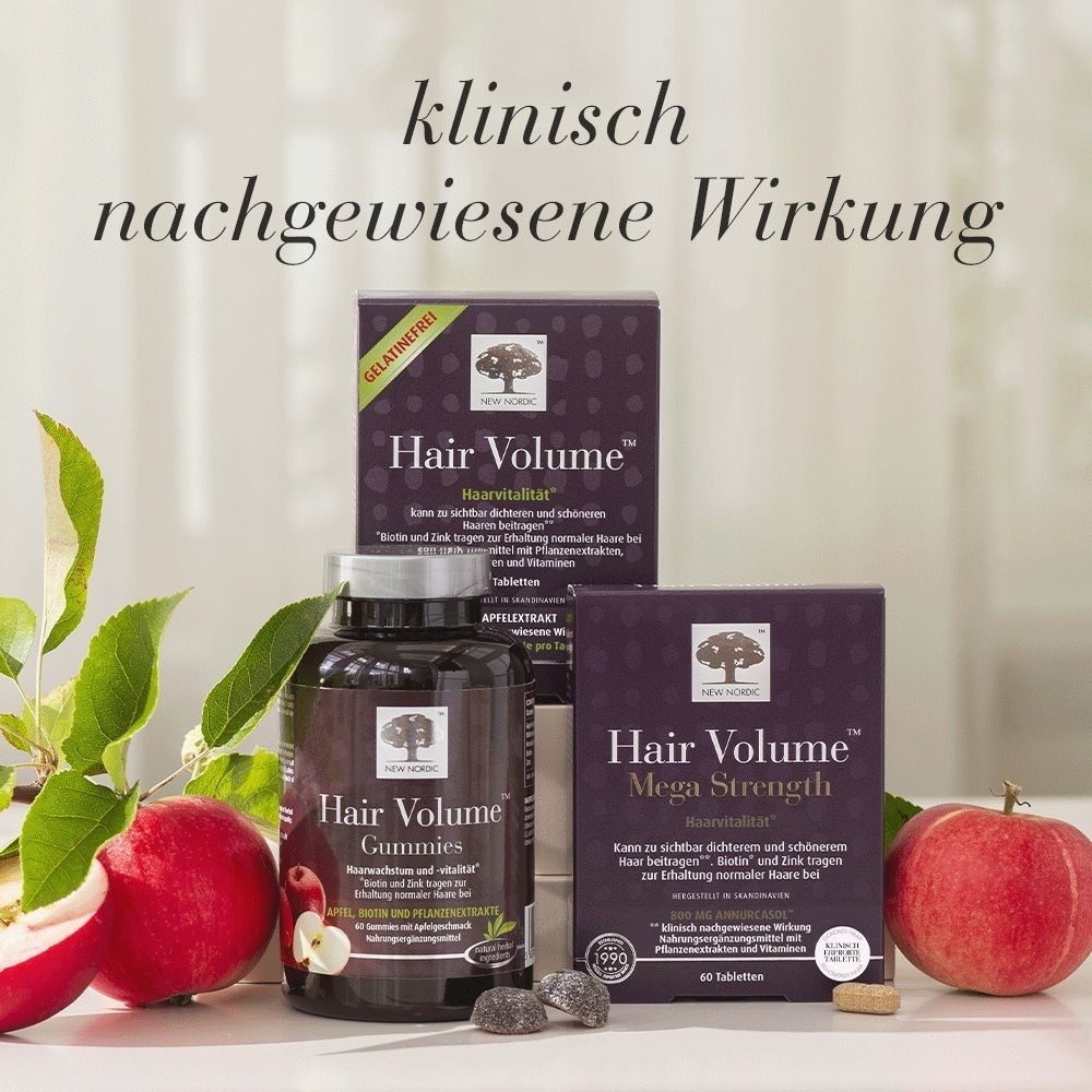 Produktpräsentation von Hair Volume Mega Strength Tabletten und Gummies mit Äpfeln.