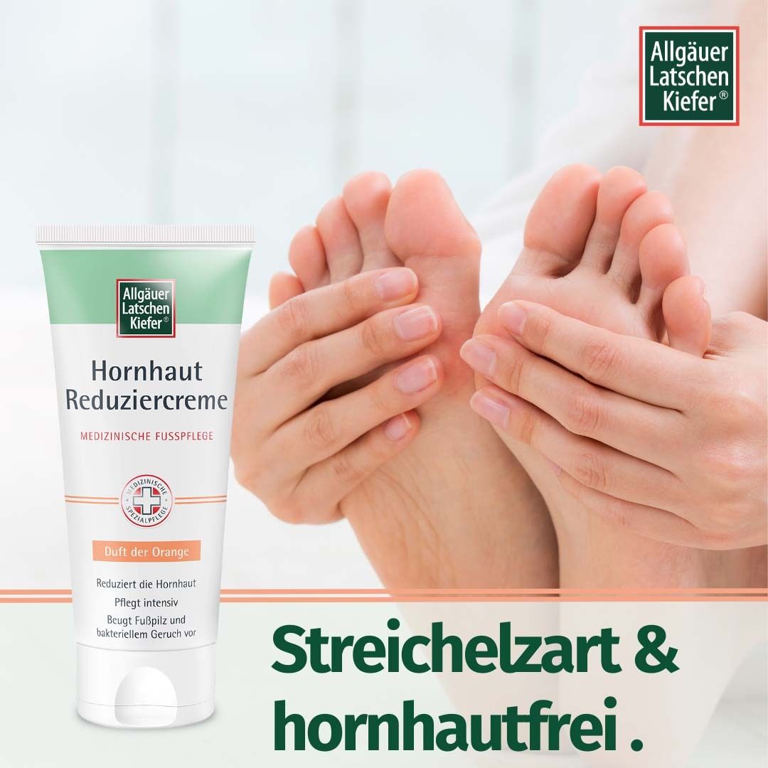 Tube Allgäuer Latschenkiefer Hornhaut Reduziercreme neben gepflegten Füßen.