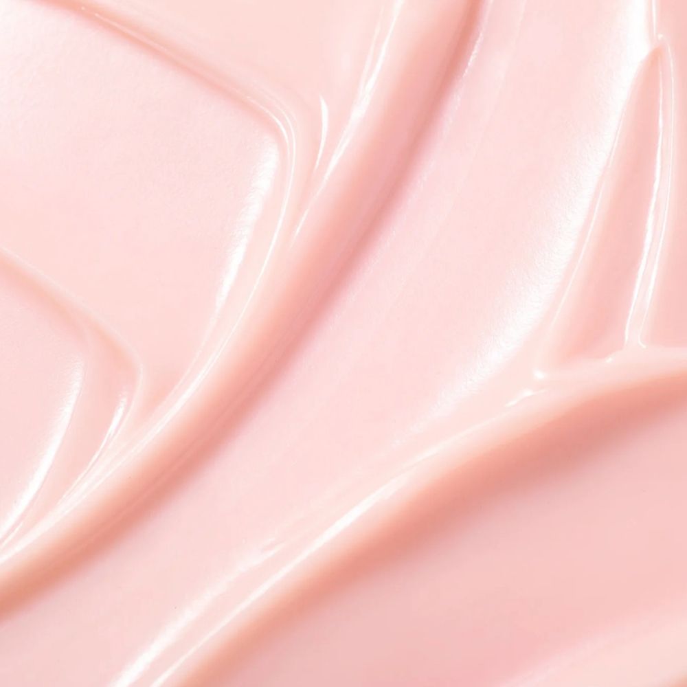 Nahaufnahme einer rosa Creme. Glatte Textur.