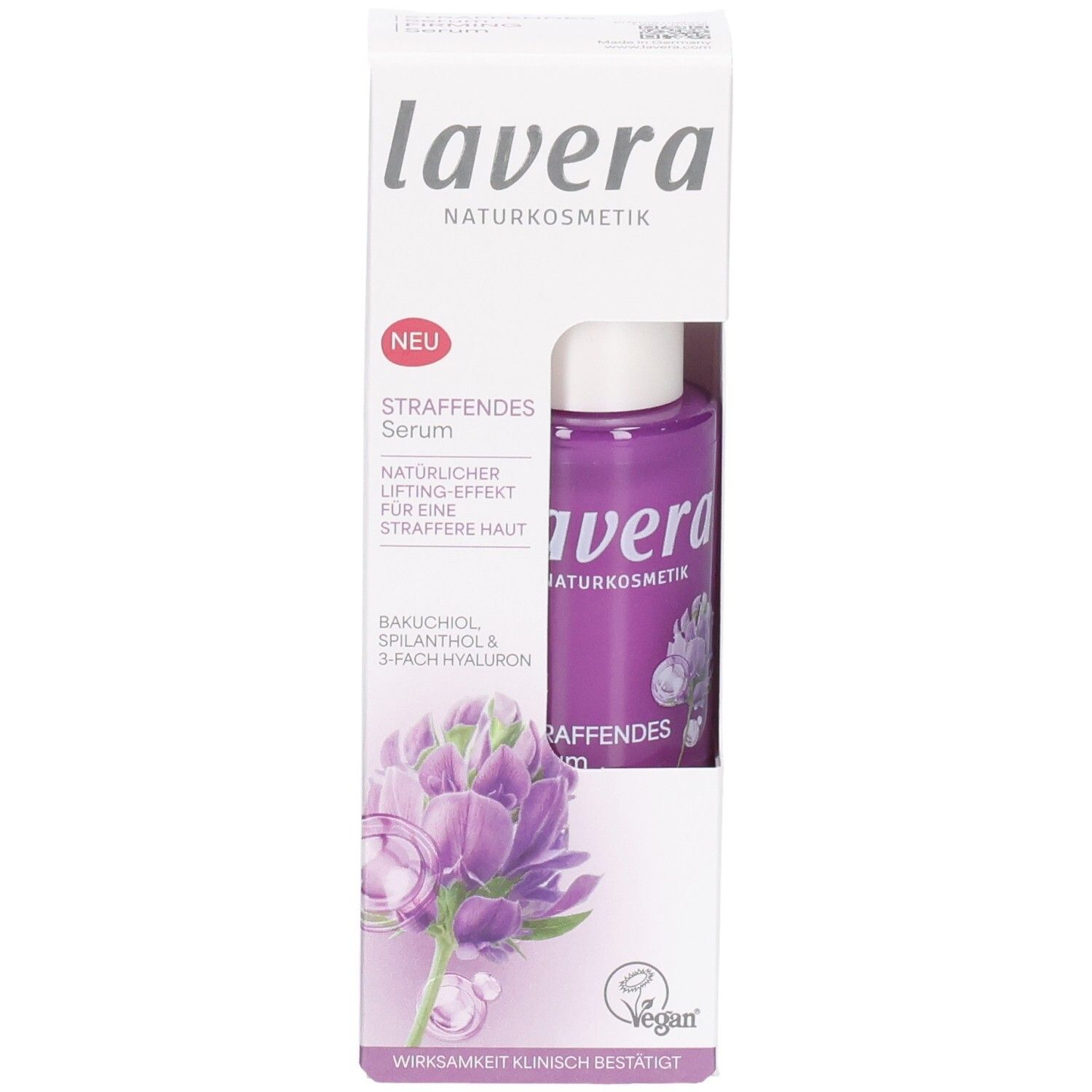 Lavera Straffendes Serum in violetter Flasche, teilweise sichtbar in weißer Kartonage mit Blütenmotiv.