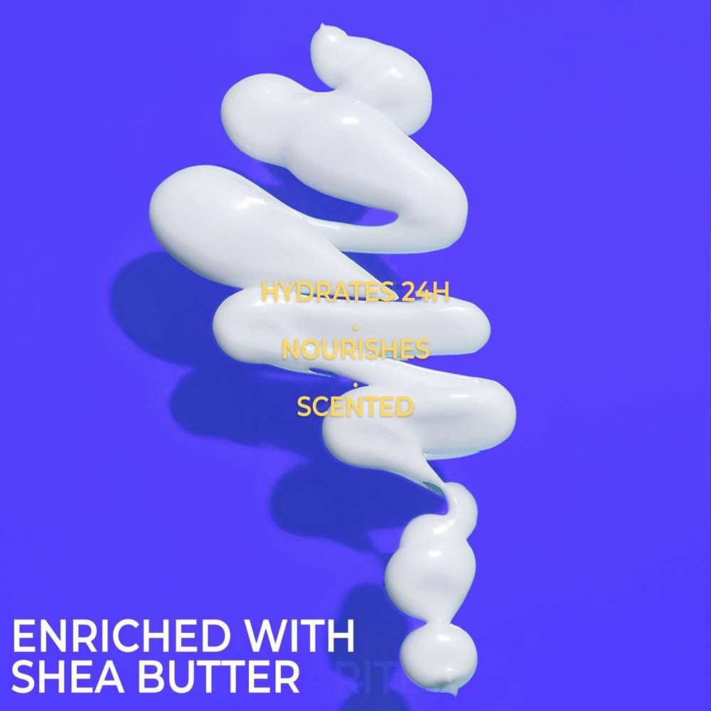Weiße Creme auf blauem Hintergrund. Text: Hydrates 24H, Nourishes, Scented, Enriched with Shea Butter.