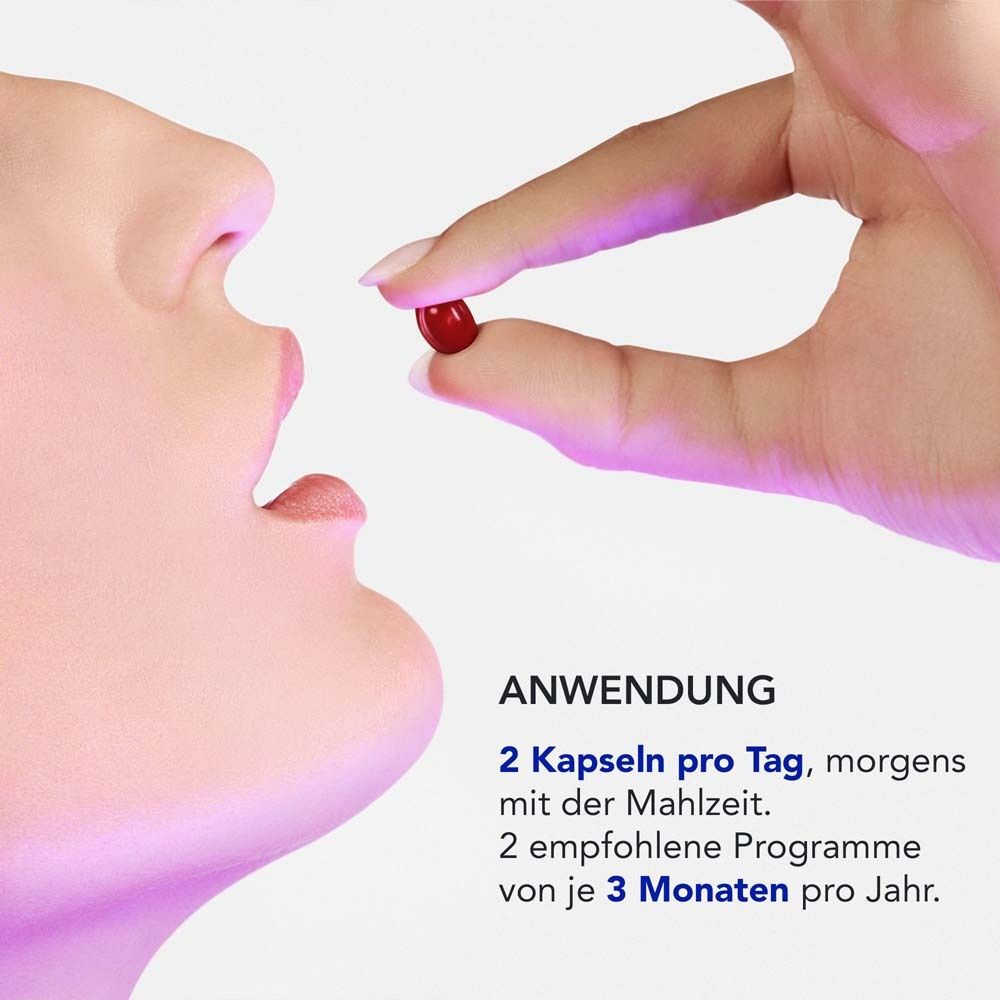 Hand nimmt eine Kapsel. Text: Anwendung: 2 Kapseln pro Tag, morgens mit der Mahlzeit. 2 empfohlene Programme von je 3 Monaten pro Jahr.