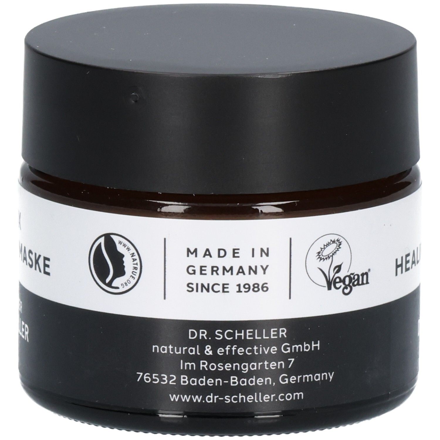 Glasgefäß mit Etikett: "MADE IN GERMANY", "SINCE 1986", "VEGAN", "DR. SCHELLER".