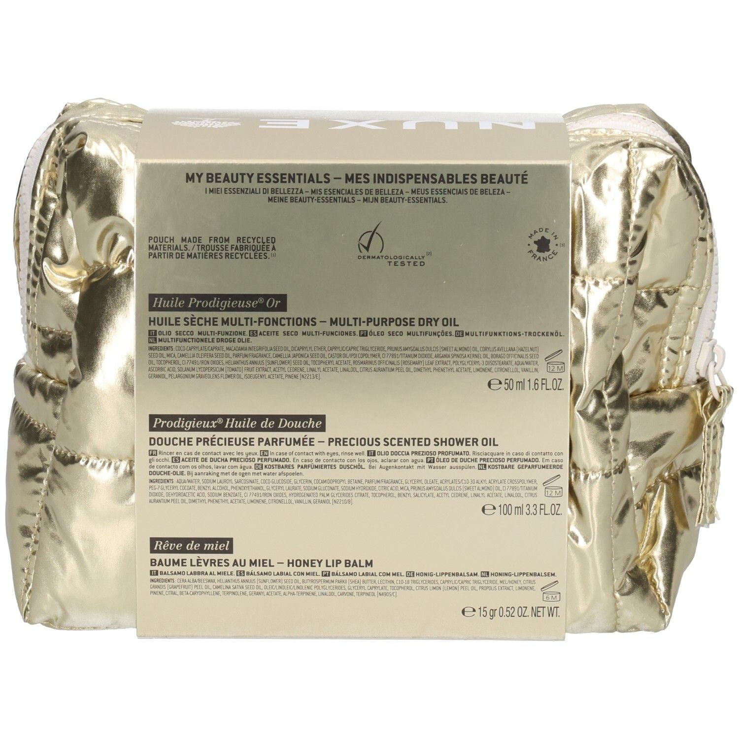 Rückseite der goldenen Kosmetiktasche mit NUXE-Produkten. Enthält Produktinformationen und Inhaltsstoffe.