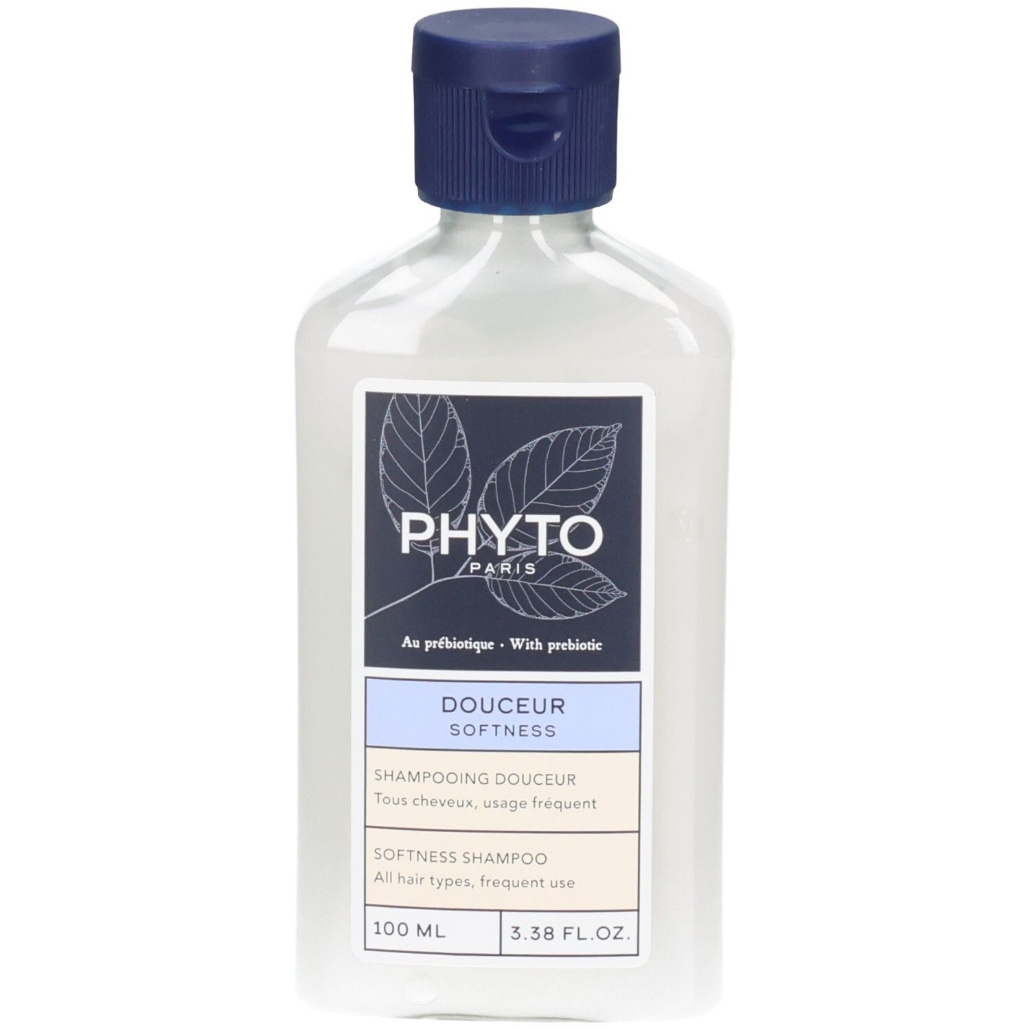 Phyto Softness Shampoo Flasche mit blauem Klappdeckel. Klare Flasche mit weißem Etikett und Blattmotiv.