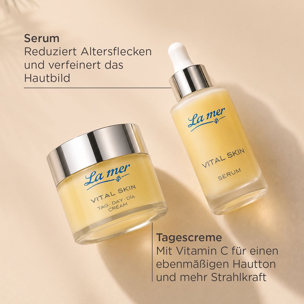 La mer Vital Skin Tag/Nachtcreme und Serum in Glasbehältern mit silbernen Deckeln.