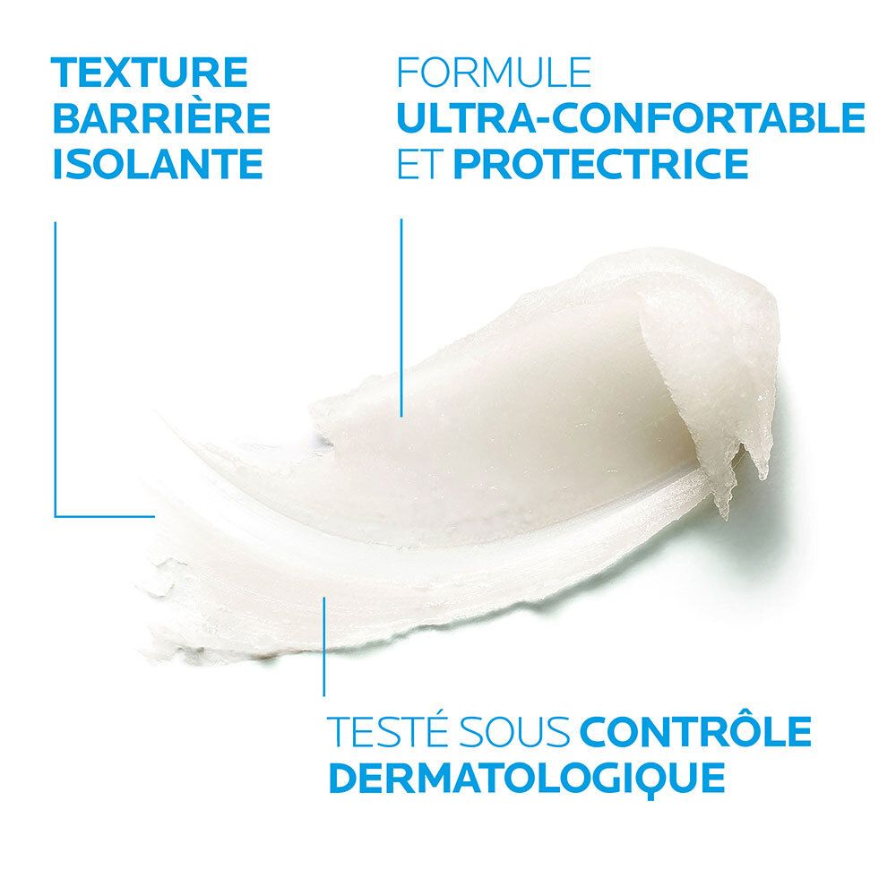Gros plan d'une crème blanche. Texte : TEXTURE BARRIERE ISOLANTE, FORMULE ULTRA-CONFORTABLE ET PROTECTRICE, TESTÉ SOUS CONTRÔLE DERMATOLOGIQUE.