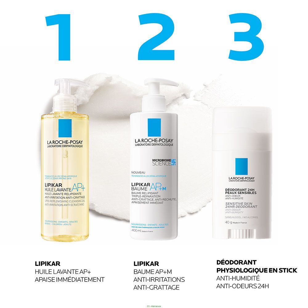 Trois produits: huile, baume, stick déo. Stick: blanc, carré bleu, texte Déodorant 24H. Marque: La Roche-Posay.