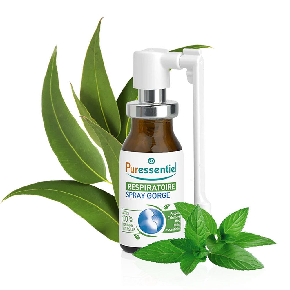 Flacon marron avec vaporisateur blanc. PURESSENTIEL RESPIRATOIRE SPRAY GORGE. Feuilles d'eucalyptus et menthe en arrière-plan.