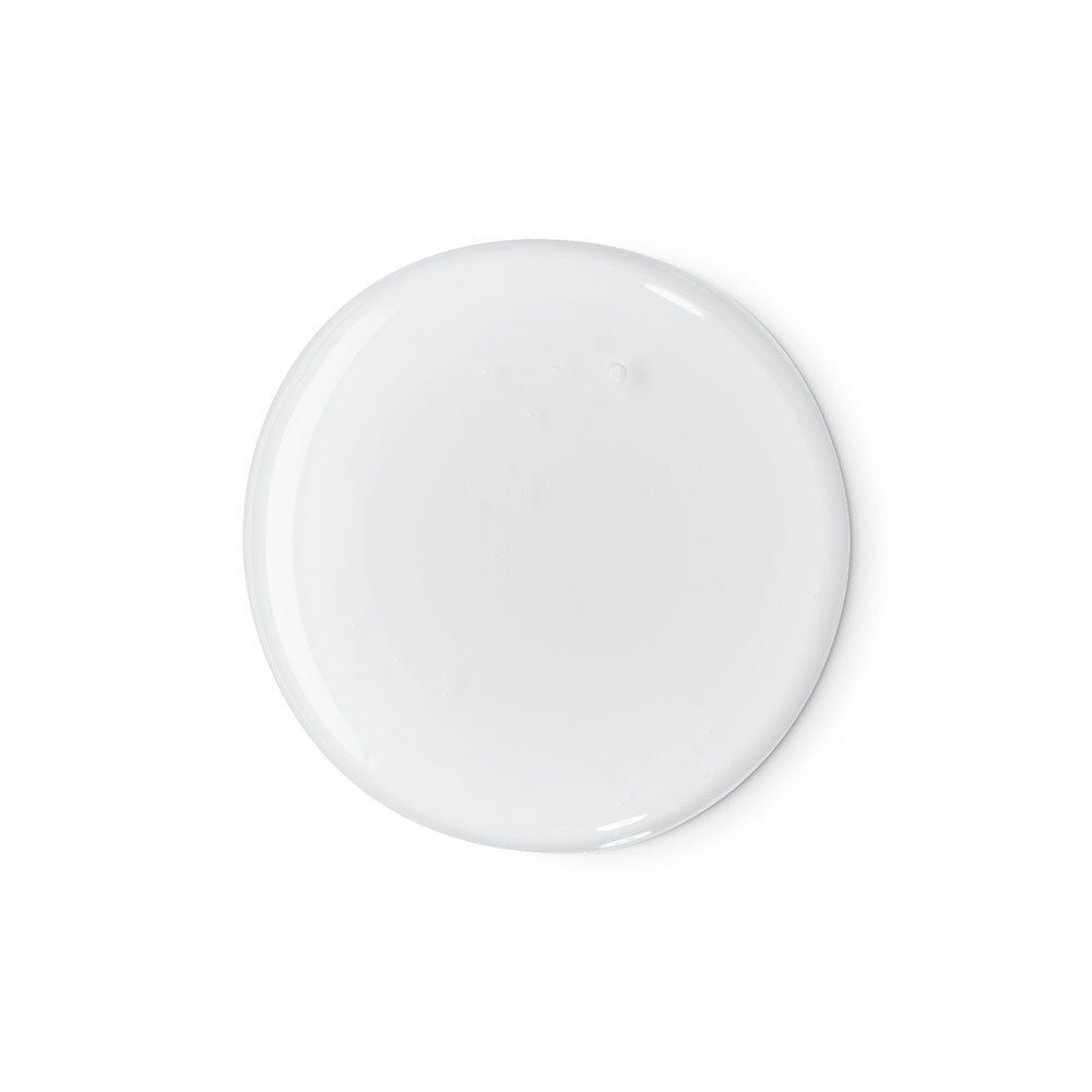 Produit blanc et rond. Probablement du shampooing. Sur fond blanc.