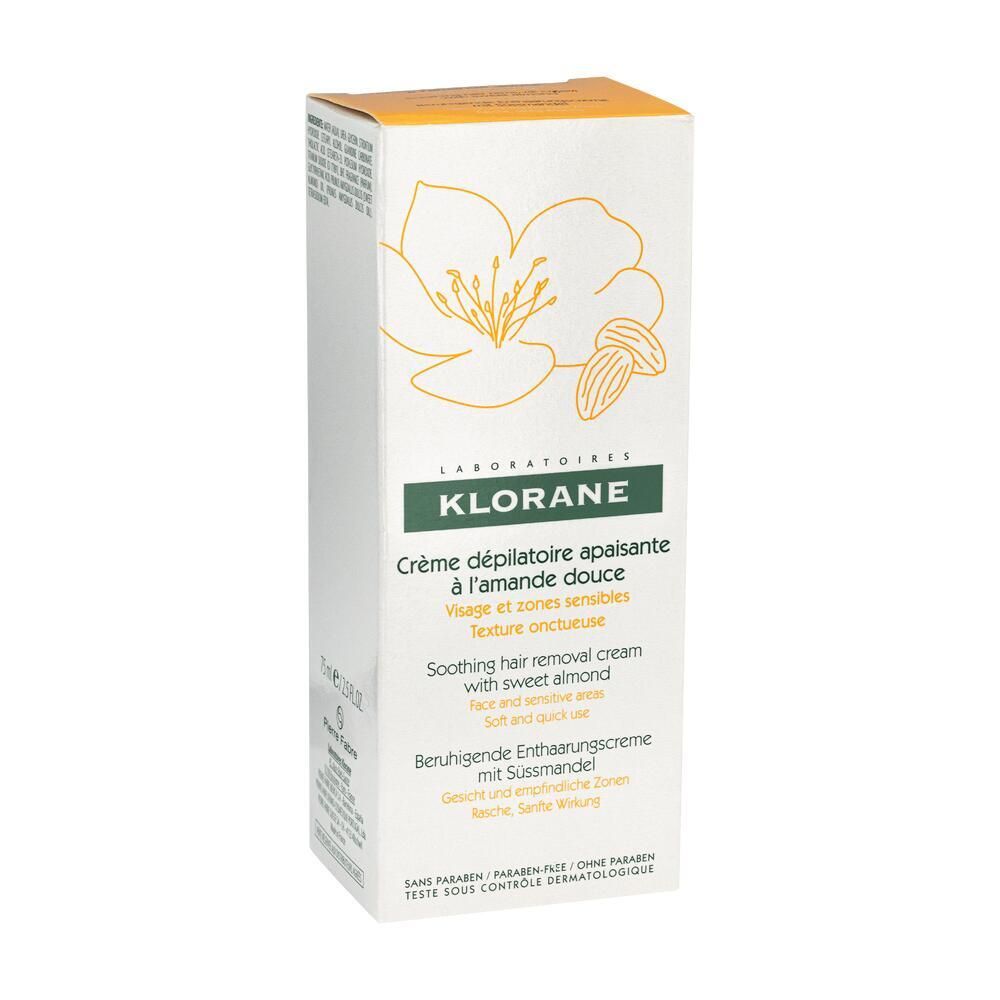 Emballage de la crème dépilatoire KLORANE. Boîte blanche avec design floral jaune. Texte: Visage et zones sensibles, 75 ml.