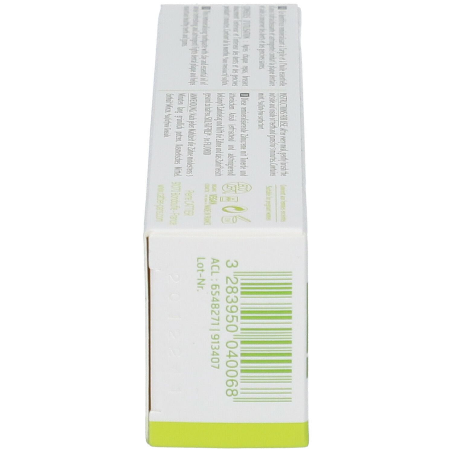 Côté de l'emballage de dentifrice. Texte et code-barres. Inscriptions: Cattier, Dentargile.