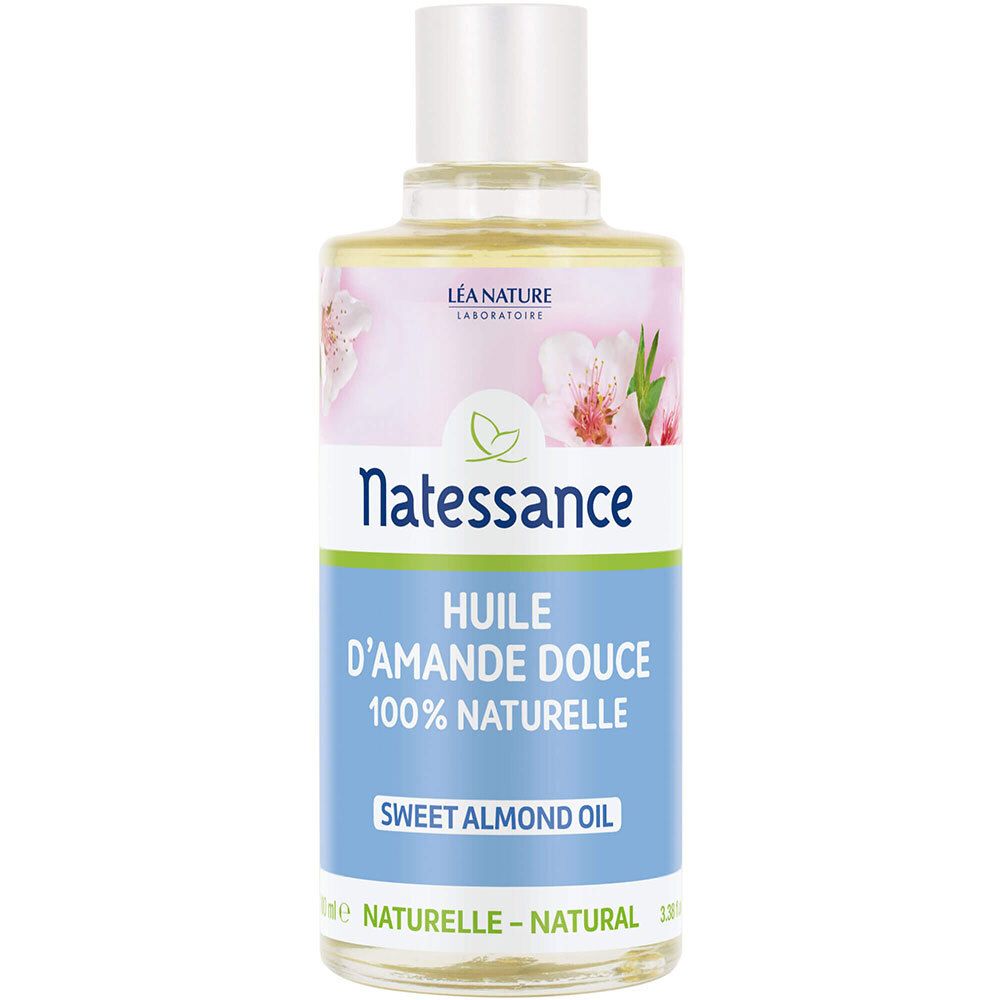 Flasche mit Etikett. Aufschrift: Natessance, Huile d'Amande Douce, 100% Naturelle, Sweet Almond Oil. Blüten-Dekor.