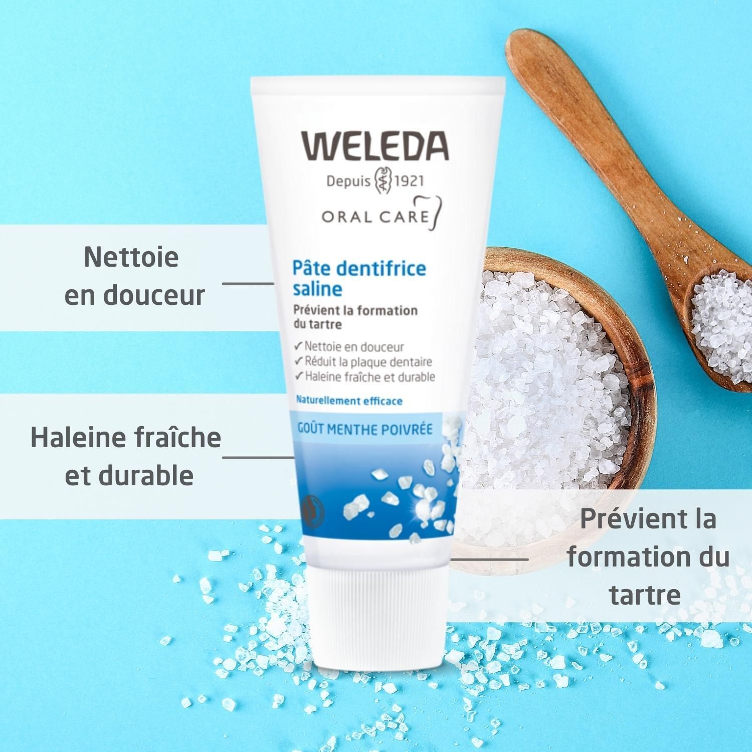 Tube und Holzlöffel mit Salz. Text: Pâte dentifrice saline, Weleda Oral Care. Bio-Siegel.