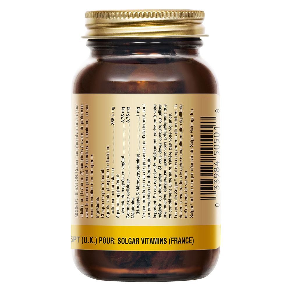 Dos d'un flacon en verre brun avec bouchon doré. Étiquette avec ingrédients et informations.